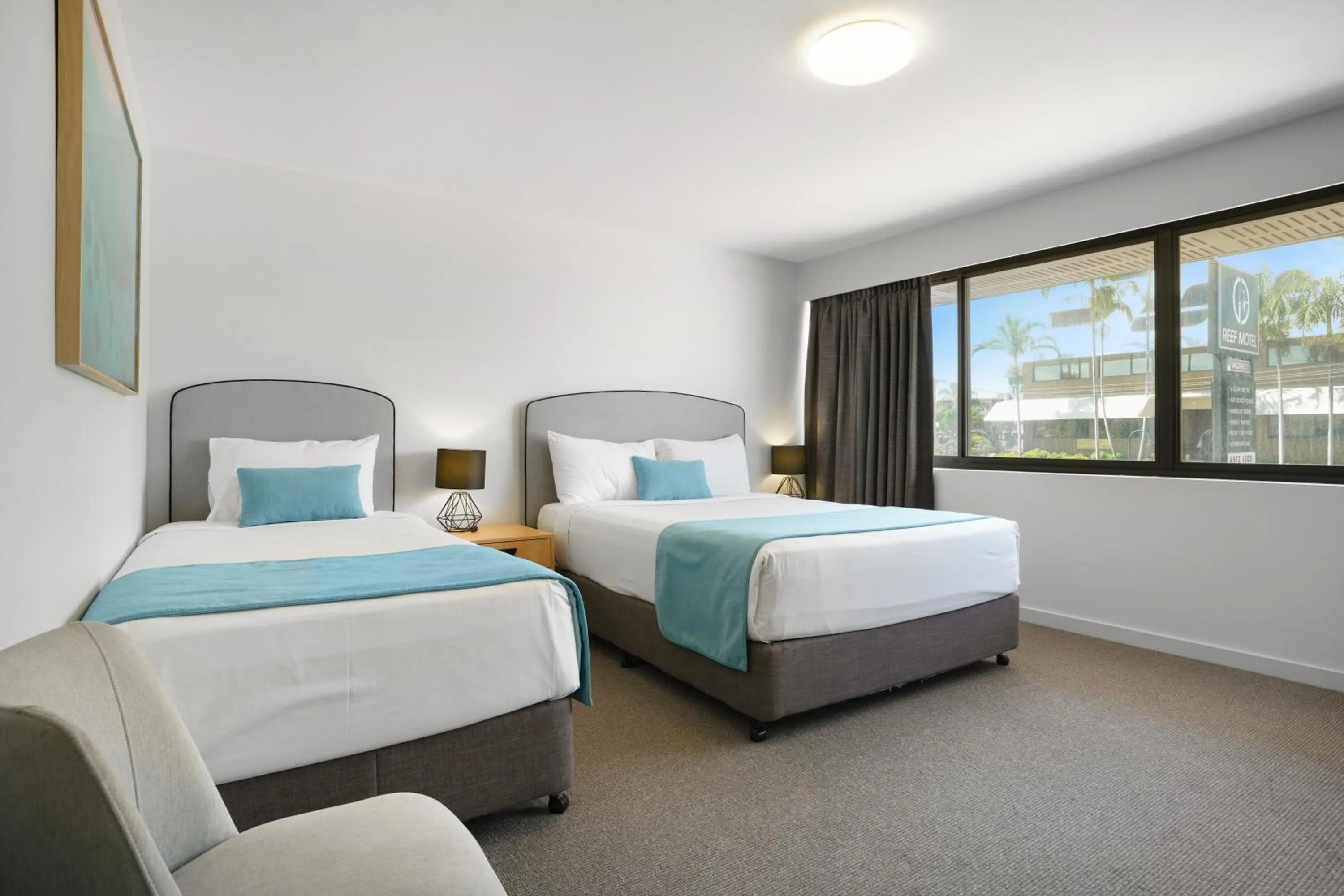 Bed in Gladstone Reef Hotel Motel