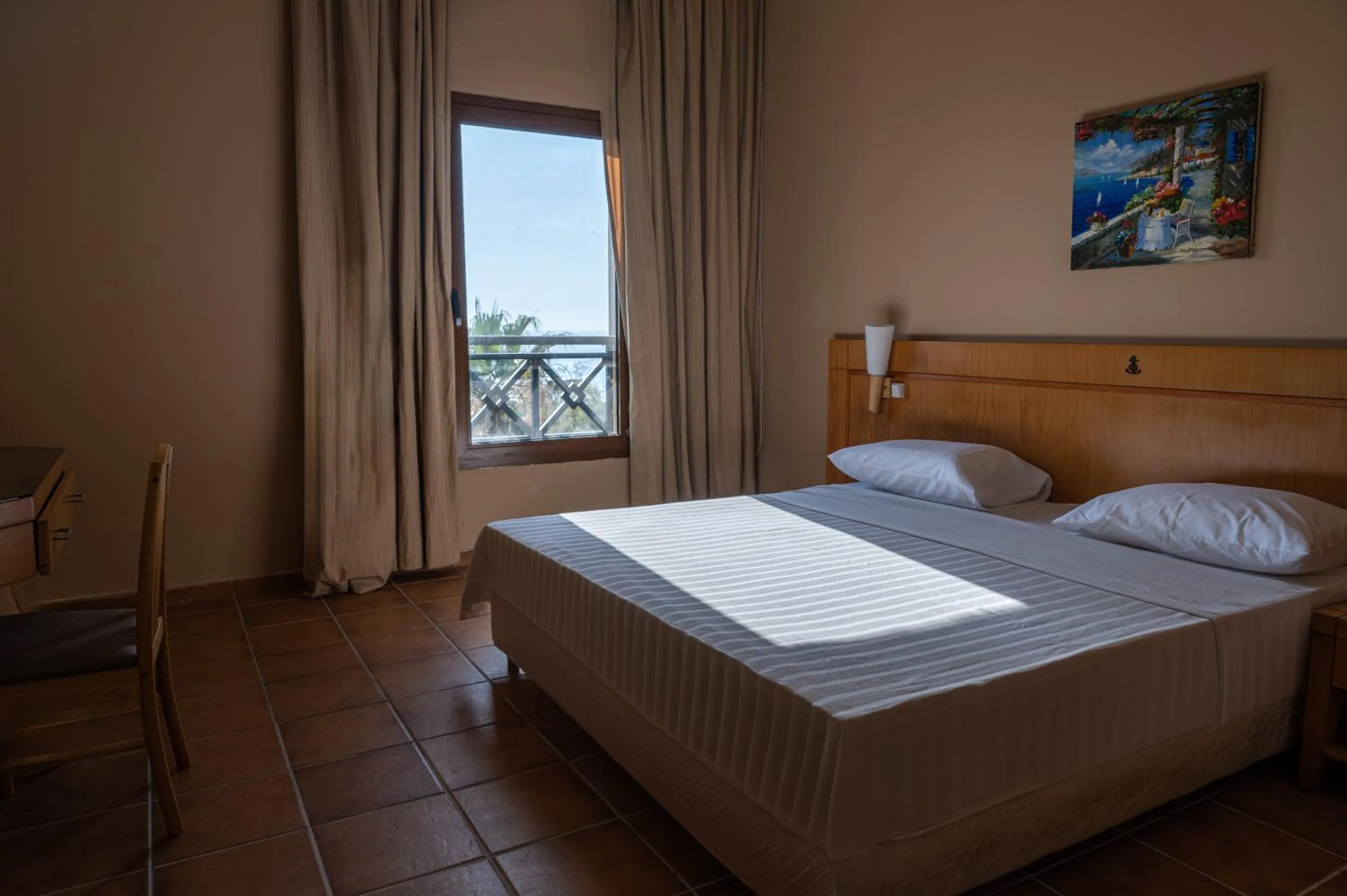 Bed in Jiyeh Marina Resort Hotel & Chalets