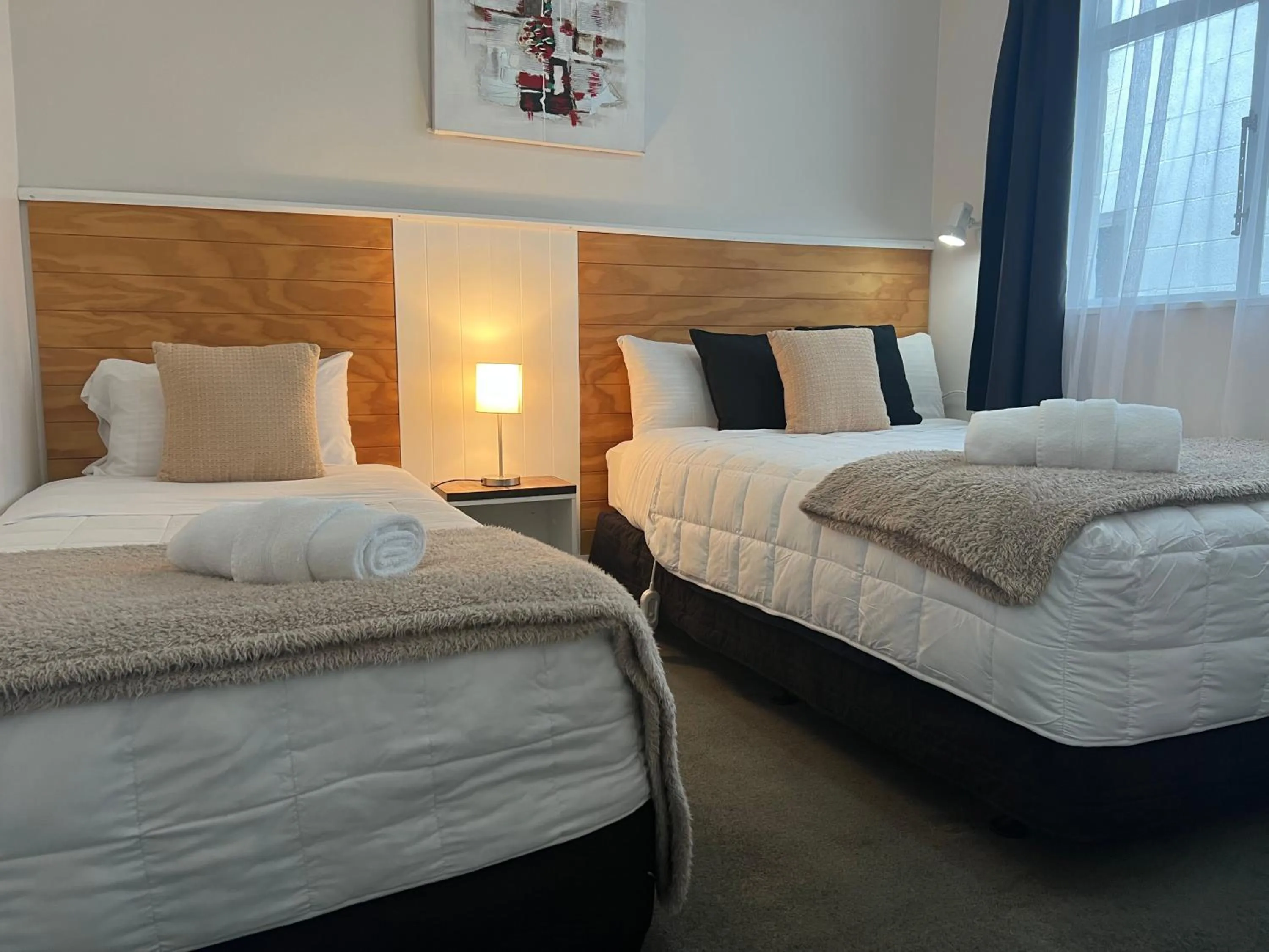 Bed in High Street Living Motel