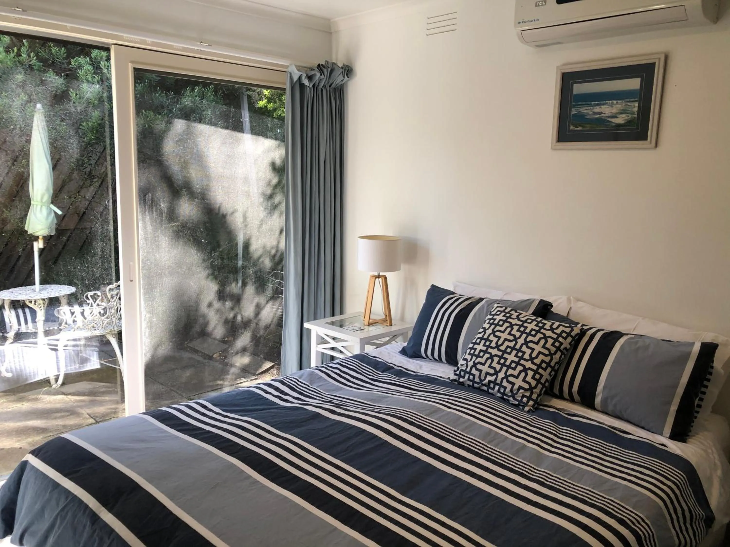 Bed in Beachwalk Cottage