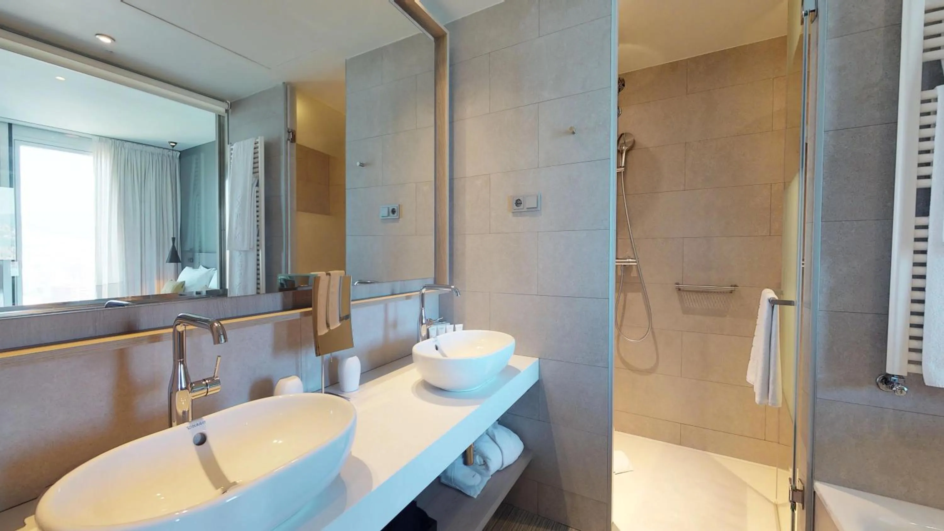 Bathroom in The Level at Melia Barcelona Sky