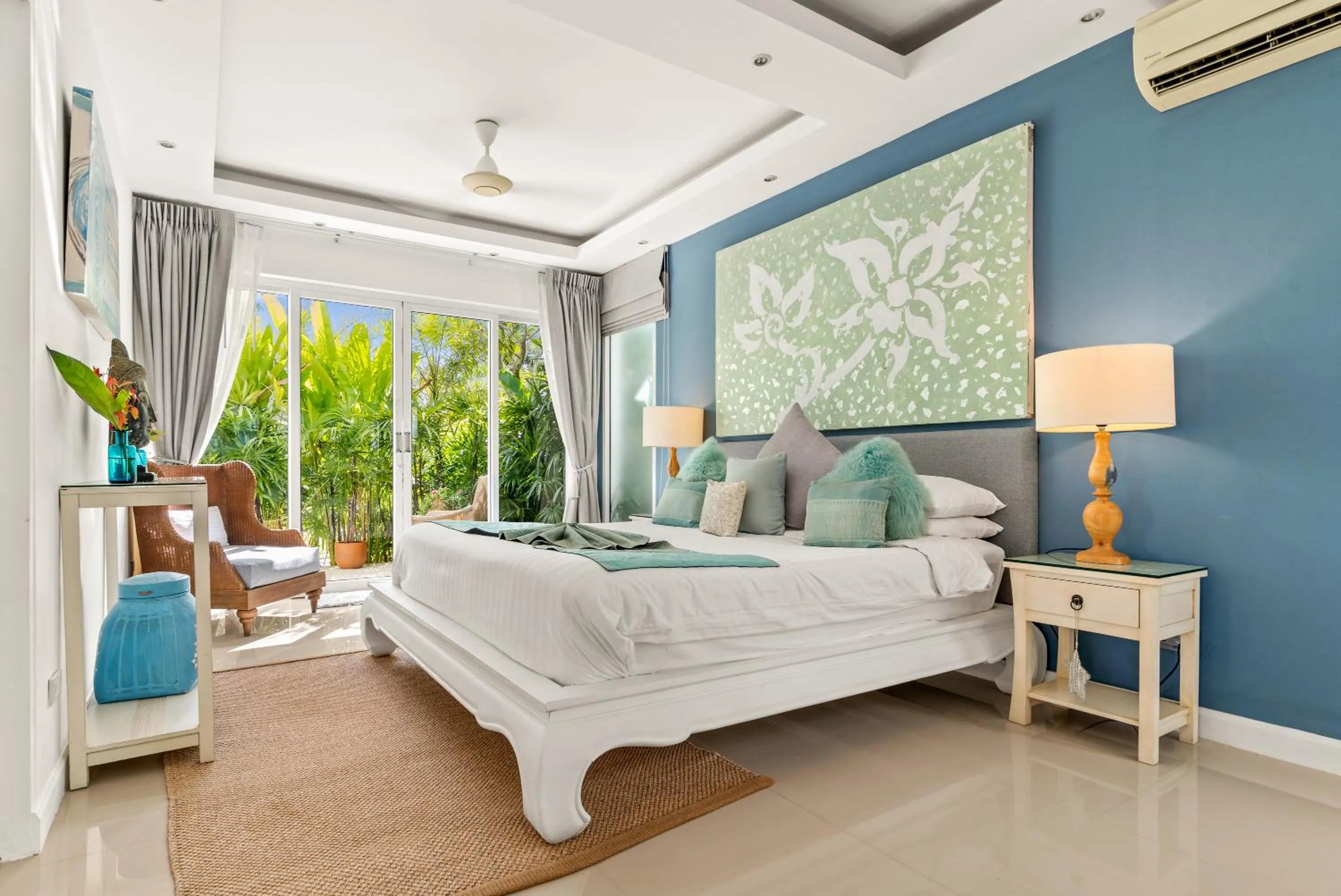 Bed in Beachfront Villa Baan Rim Haad 3BR
