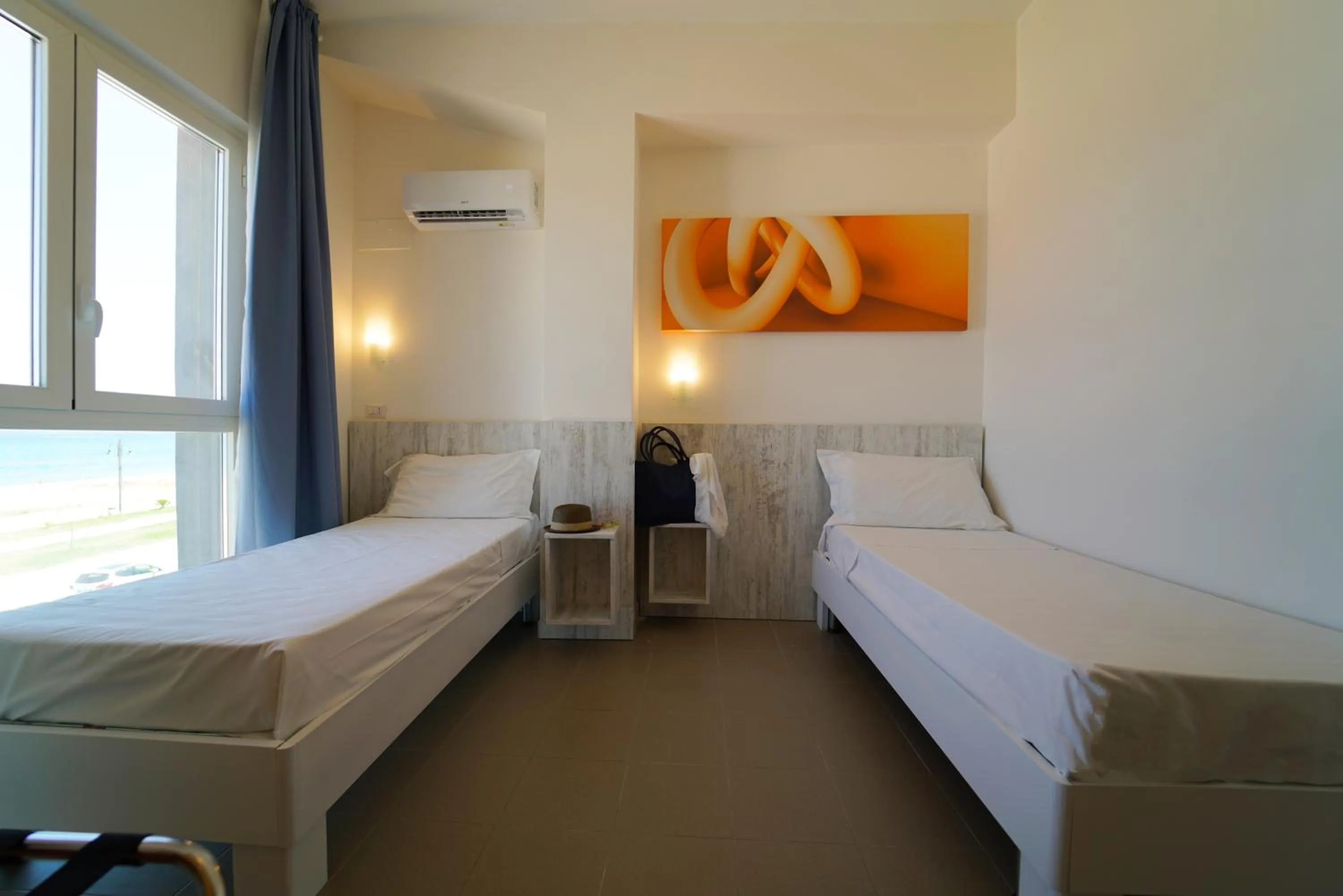 Bed in Hotel Rivabella