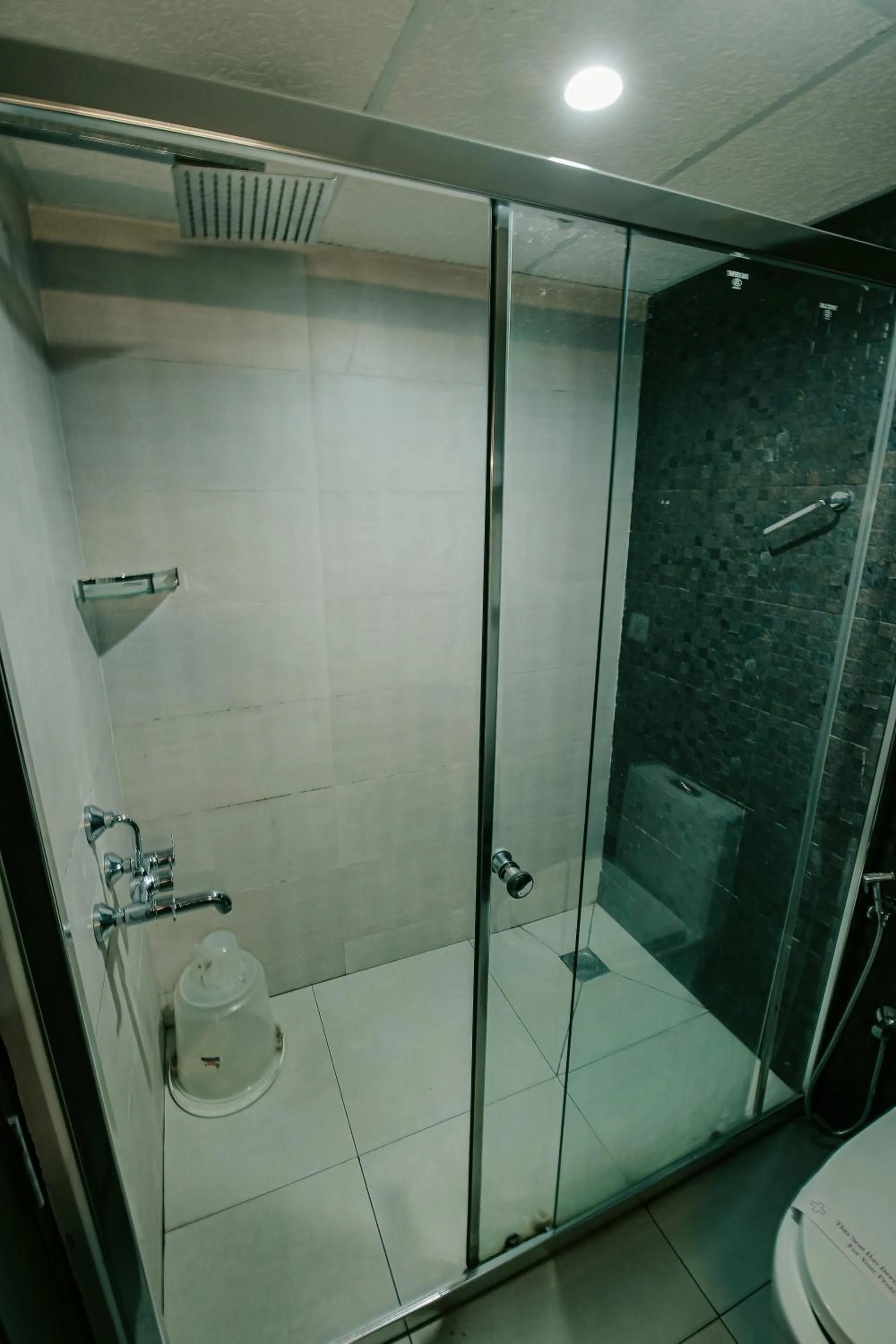 Shower in Avoki Resorts