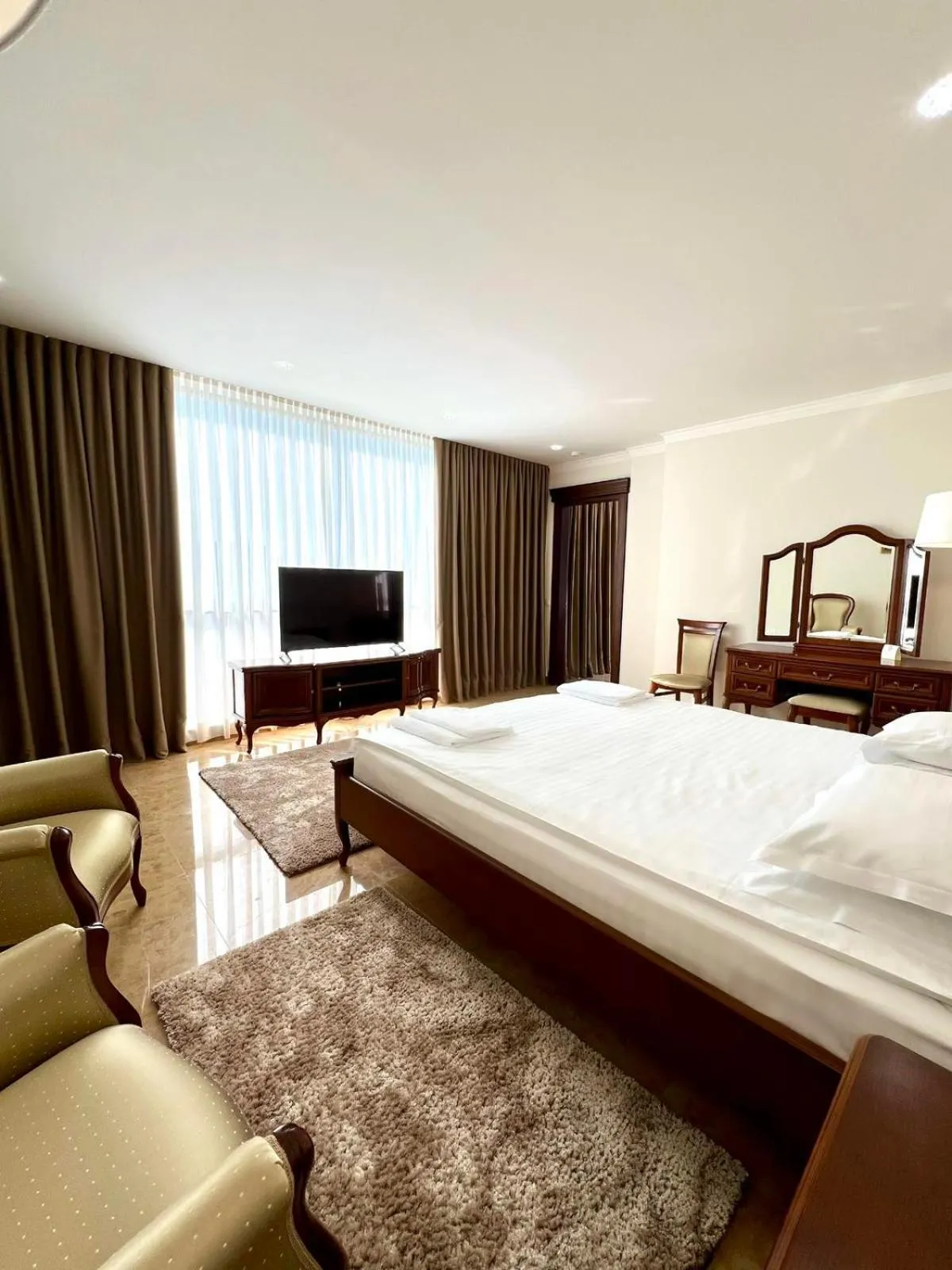 Photo of the whole room, Bed in Ambassador Hotel