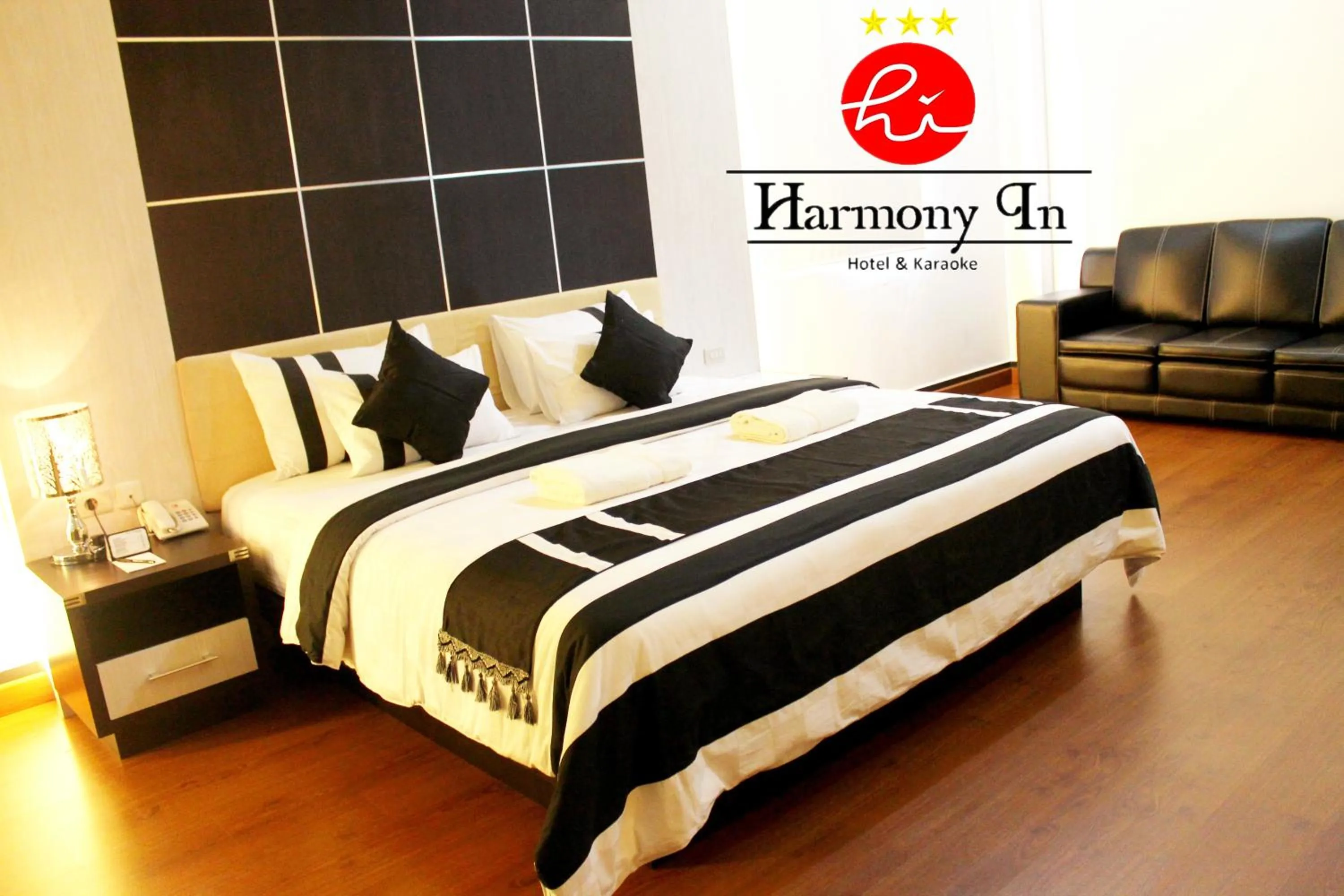 Bed in Hotel Harmony In & Karaoke
