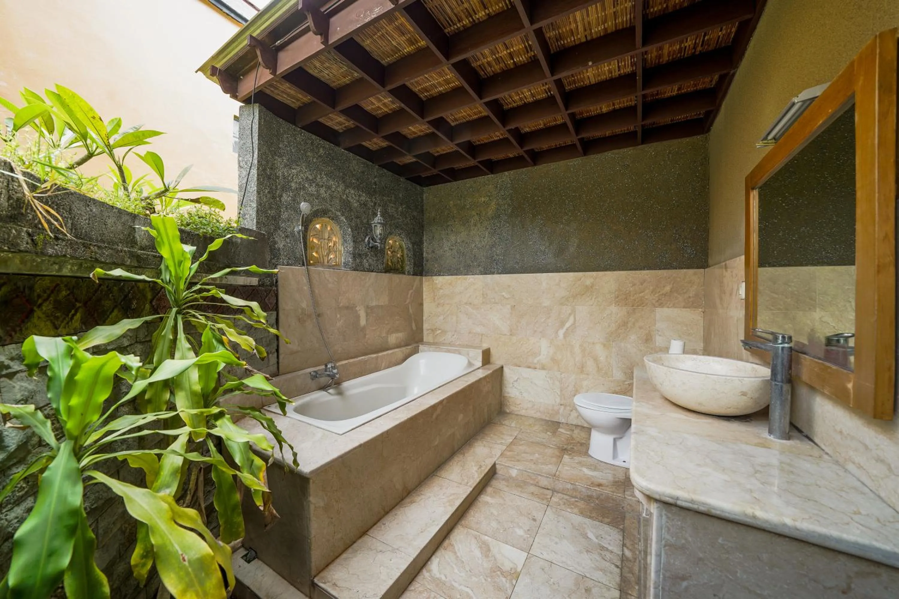 Toilet in Three Brothers Bali Legian Bungalows & Villas