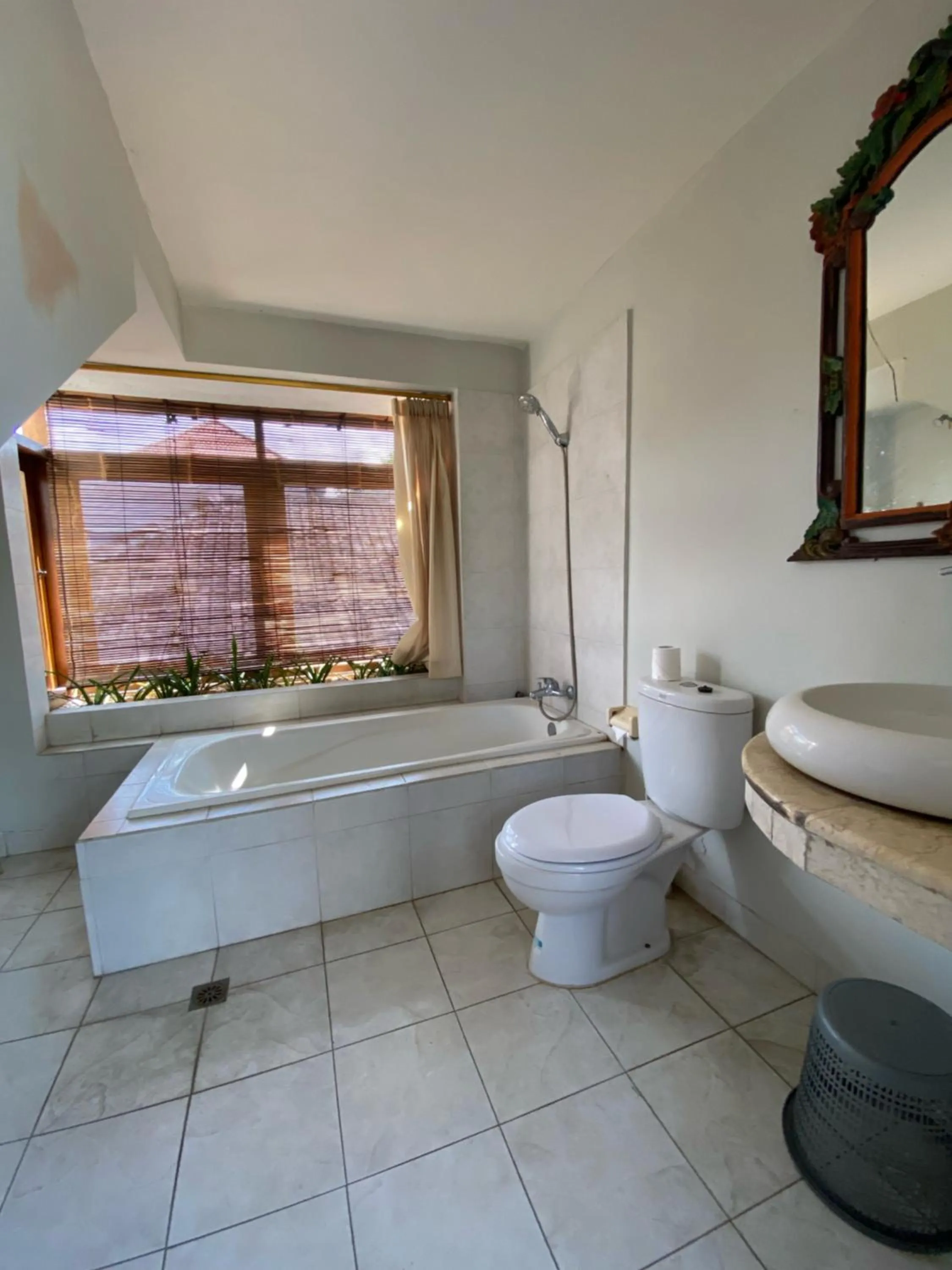 Toilet in Three Brothers Bali Legian Bungalows & Villas