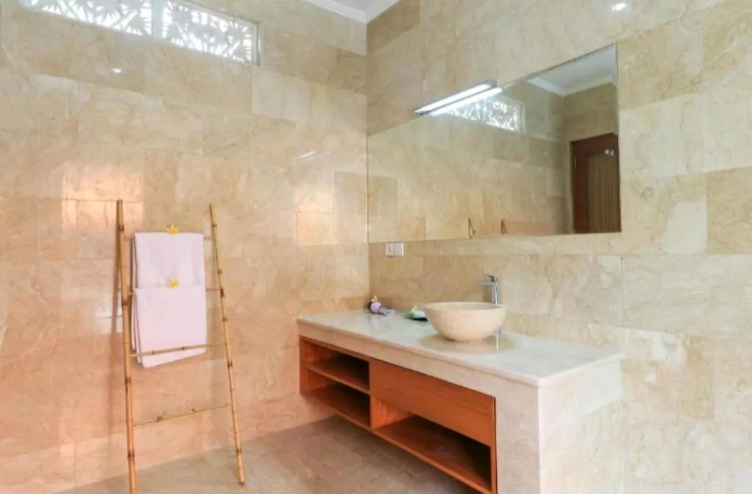 Bathroom in Three Brothers Bali Legian Bungalows & Villas