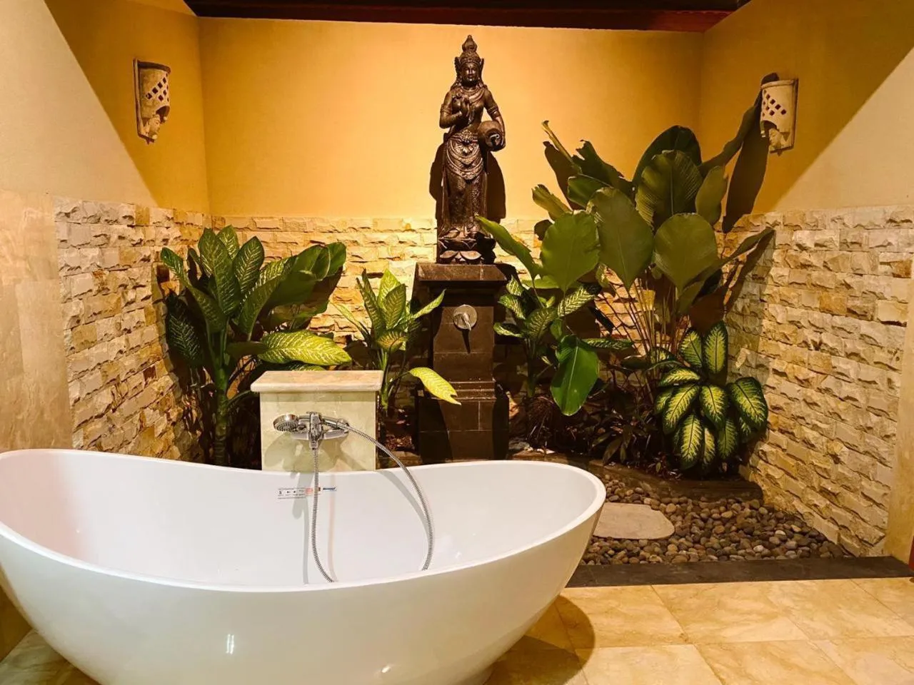 Bathroom in Three Brothers Bali Legian Bungalows & Villas