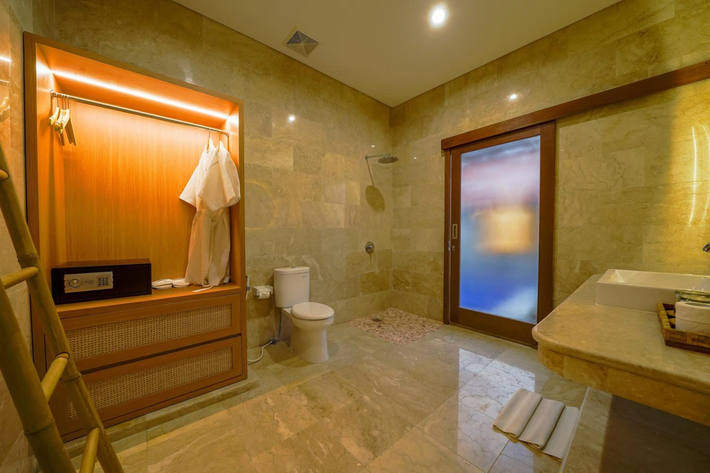 Toilet in Three Brothers Bali Legian Bungalows & Villas