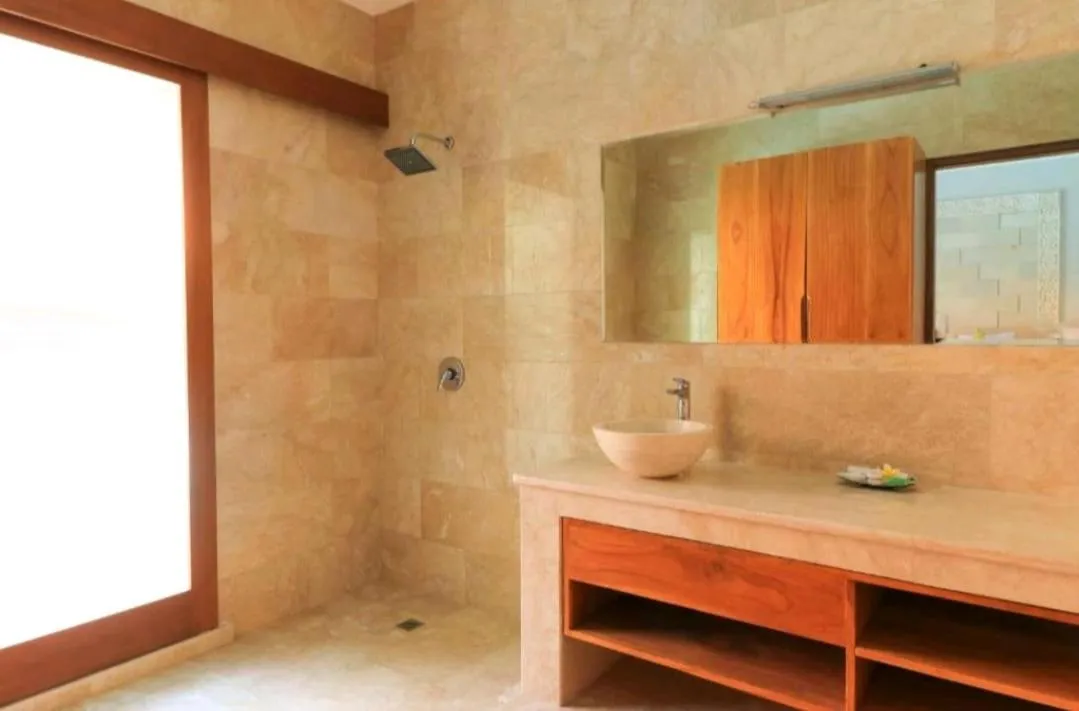 Shower in Three Brothers Bali Legian Bungalows & Villas