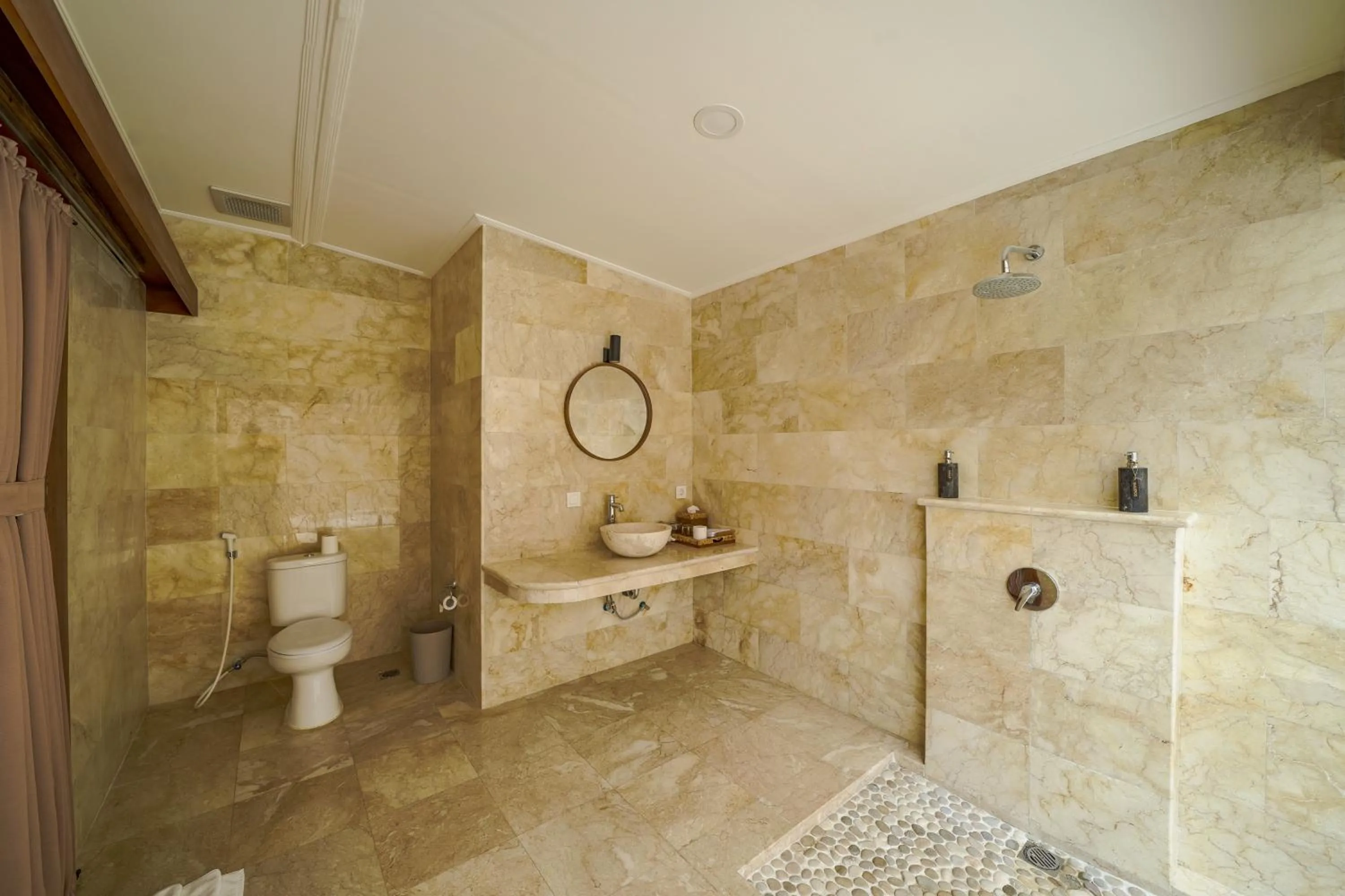 Shower in Three Brothers Bali Legian Bungalows & Villas