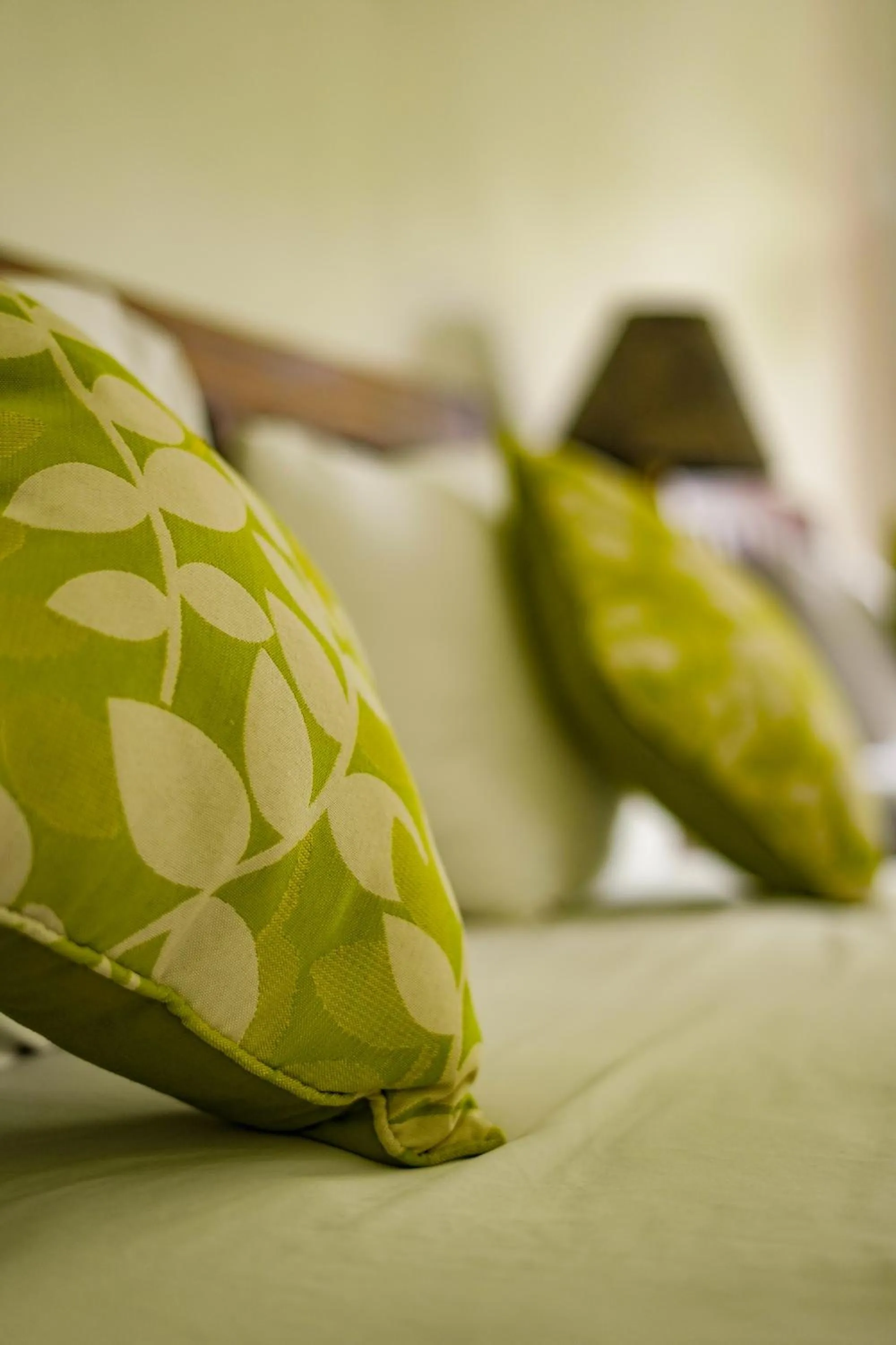 Bed in Three Brothers Bali Legian Bungalows & Villas