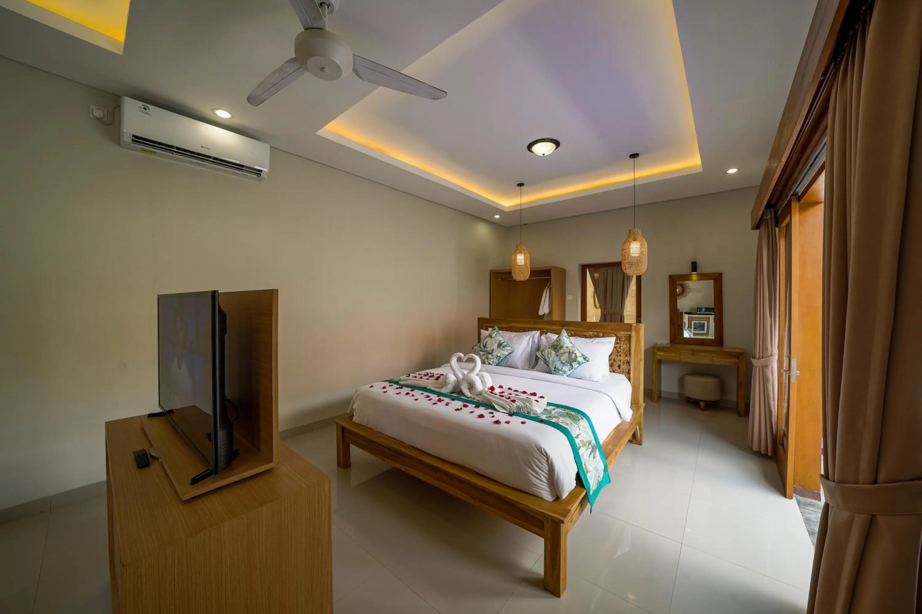 Property building, Bed in Three Brothers Bali Legian Bungalows & Villas