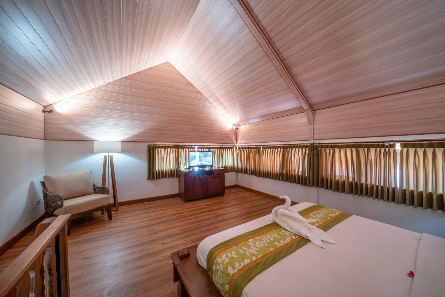 Bed in Three Brothers Bali Legian Bungalows & Villas