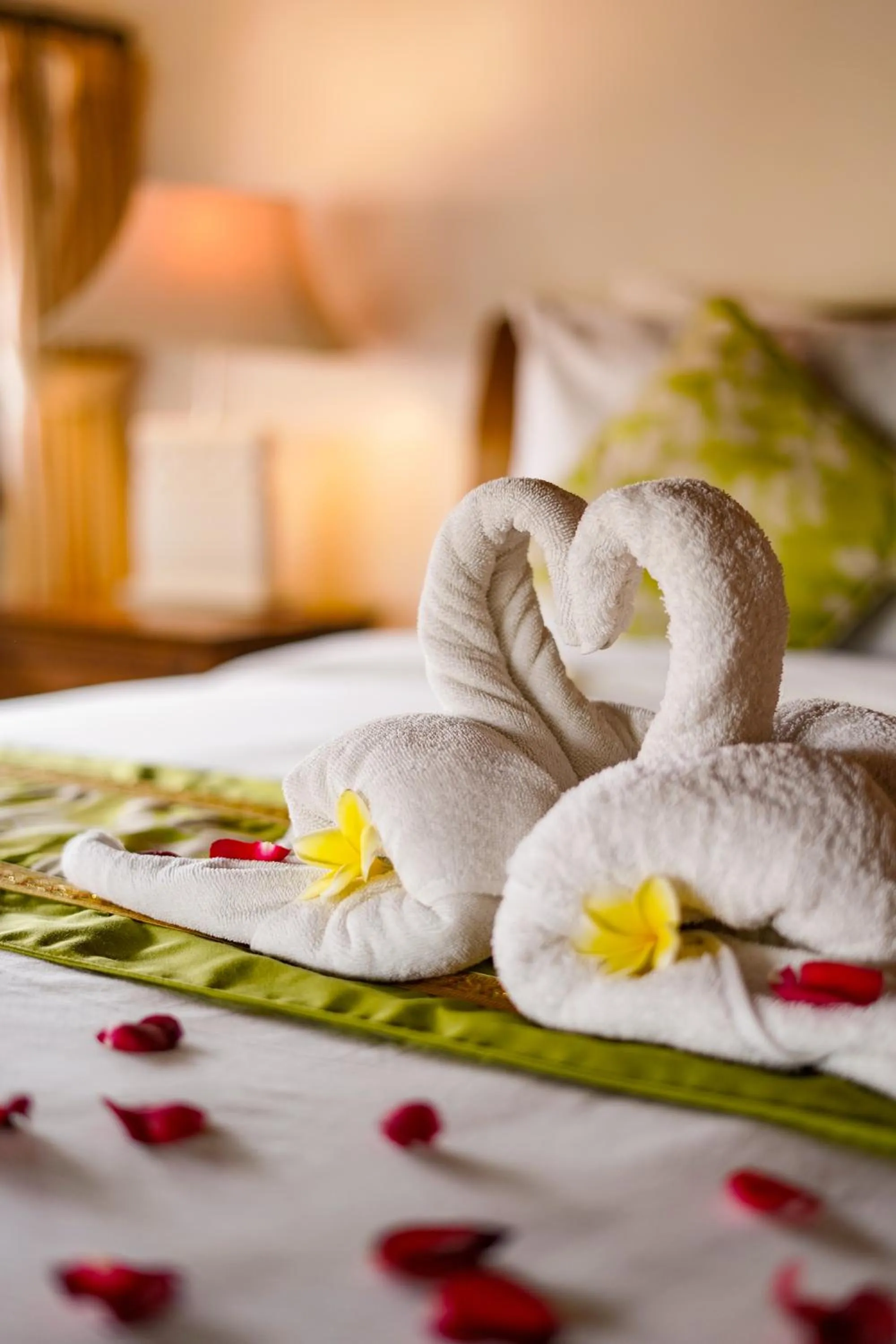 Bed in Three Brothers Bali Legian Bungalows & Villas