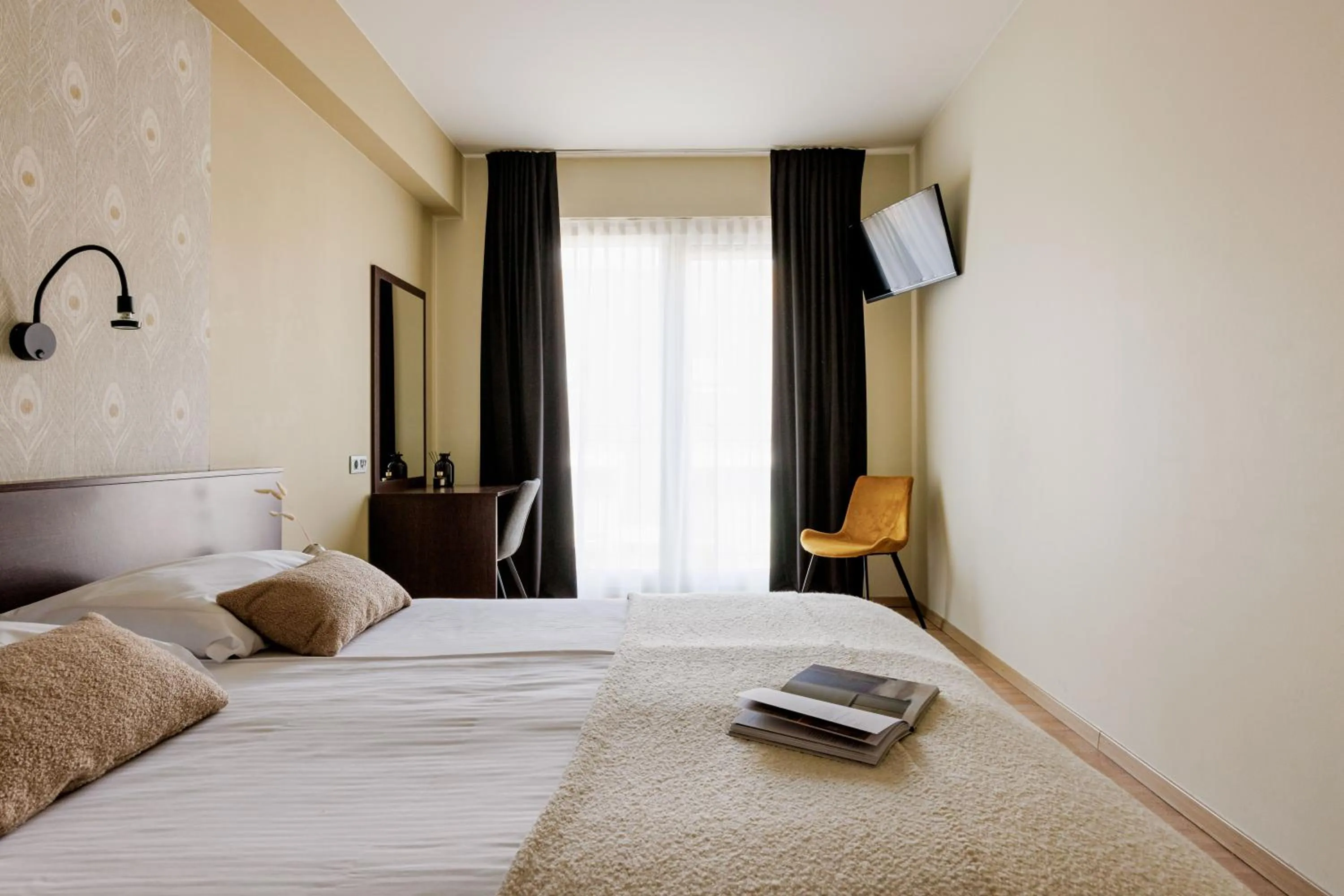 Bed in Hotel Corner House by WP Hotels