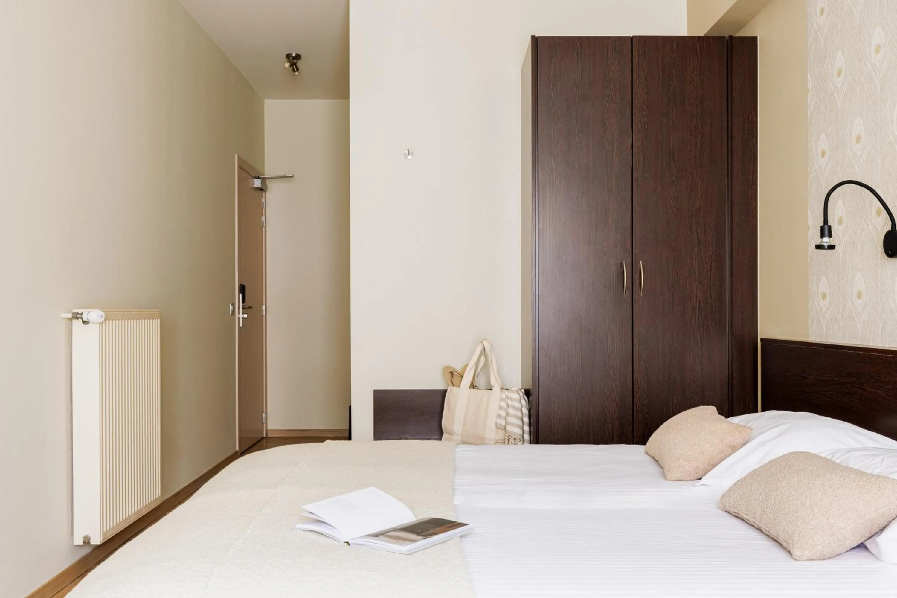 Bed in Hotel Corner House by WP Hotels