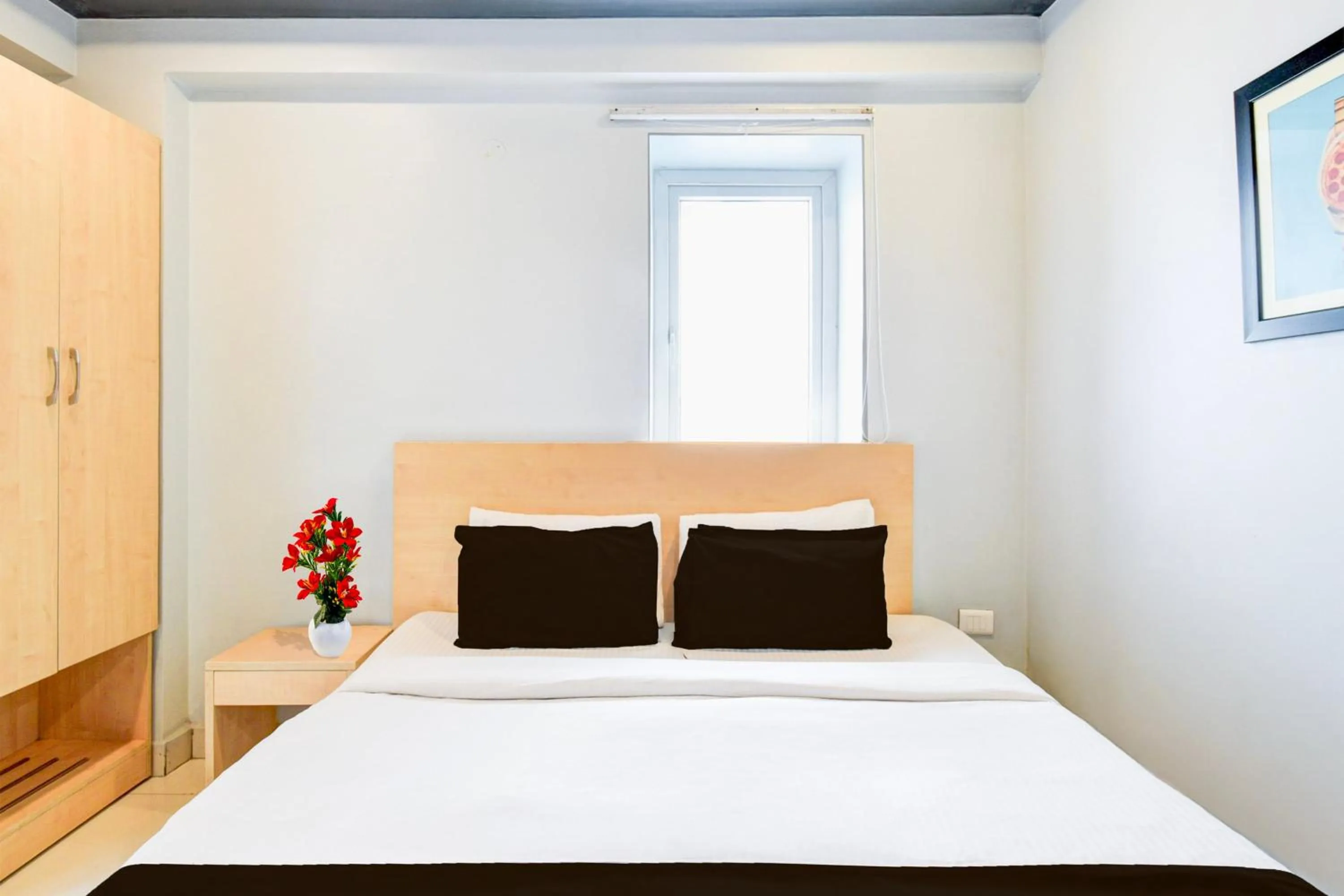 Bedroom, Bed in Super Townhouse HiTech city Hyderabad