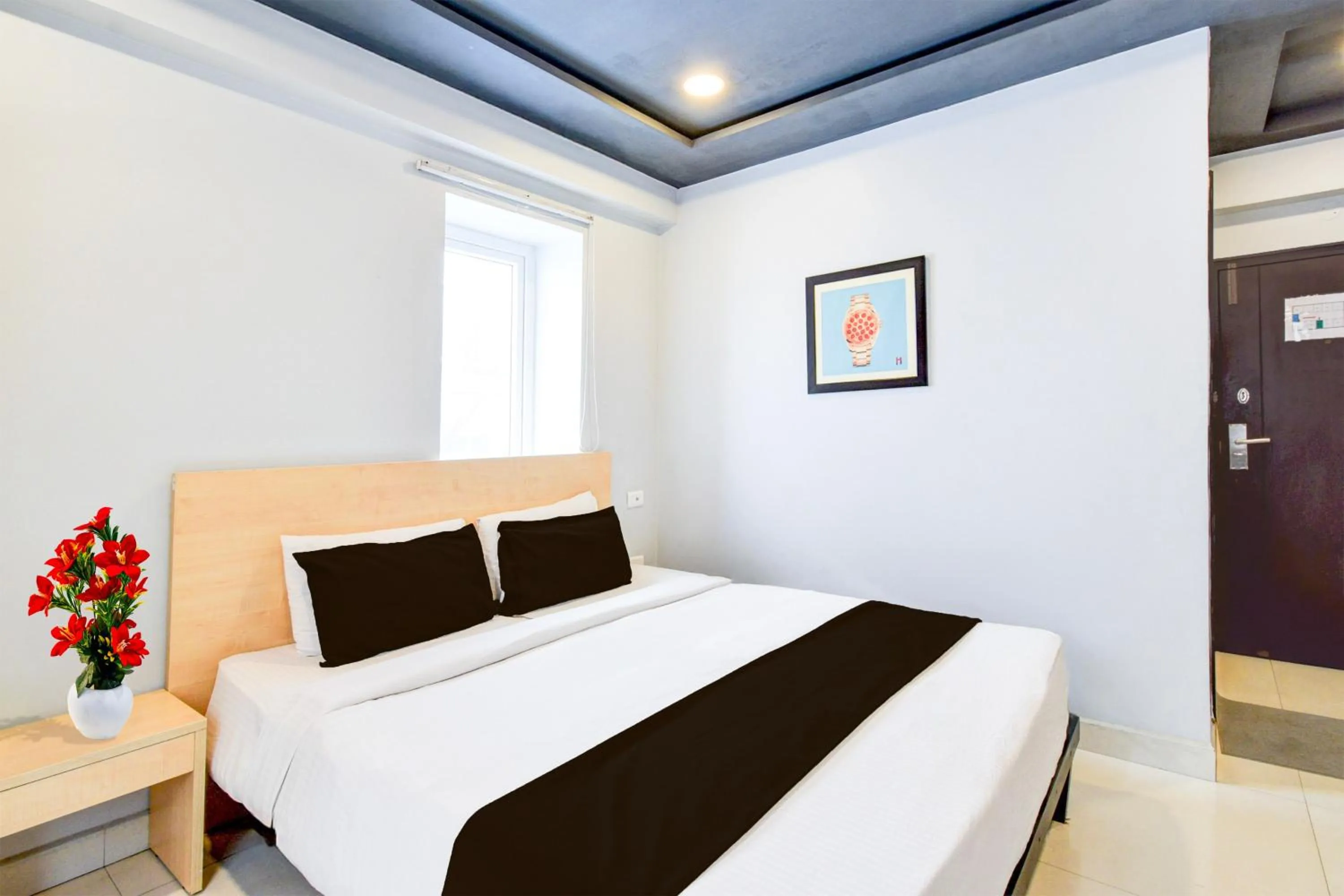 Bedroom, Bed in Super Townhouse HiTech city Hyderabad