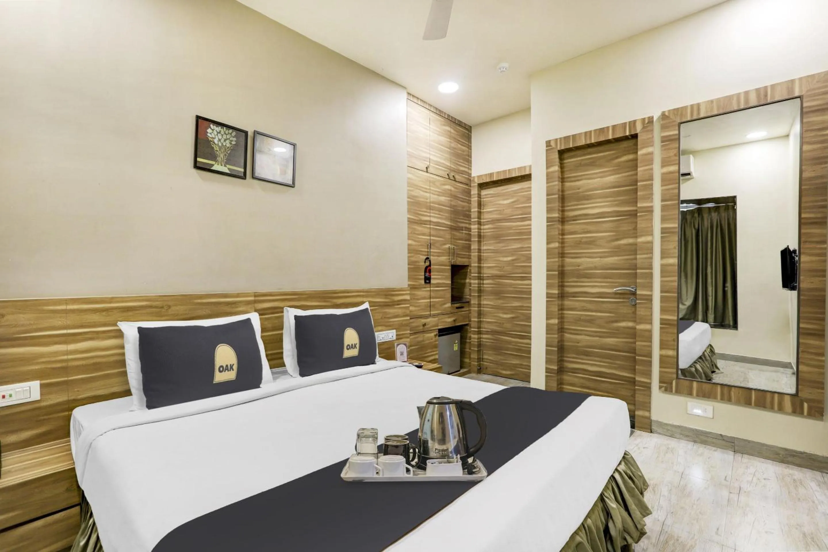 Bedroom in Super Townhouse OAK Shubhham Regency