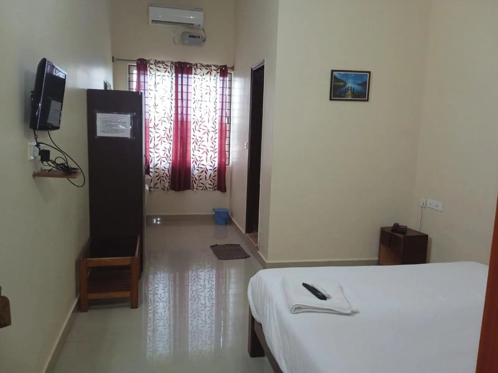 Bed in GRAND JP INN Near 2 km from Gundlupet bus stand
