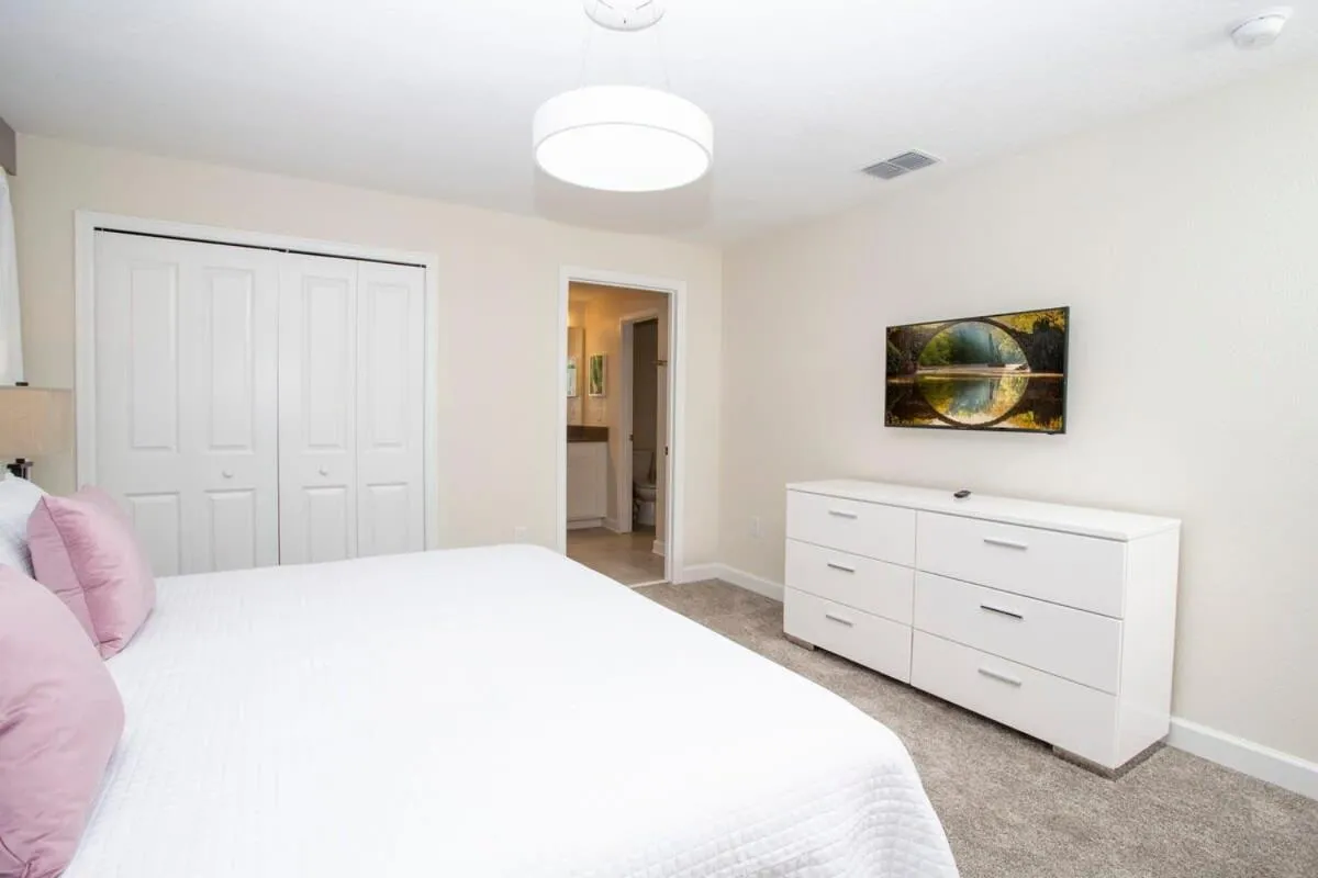 Bed in Gorgeous 4 Bedroom w/ Pool Close to Disney 4836