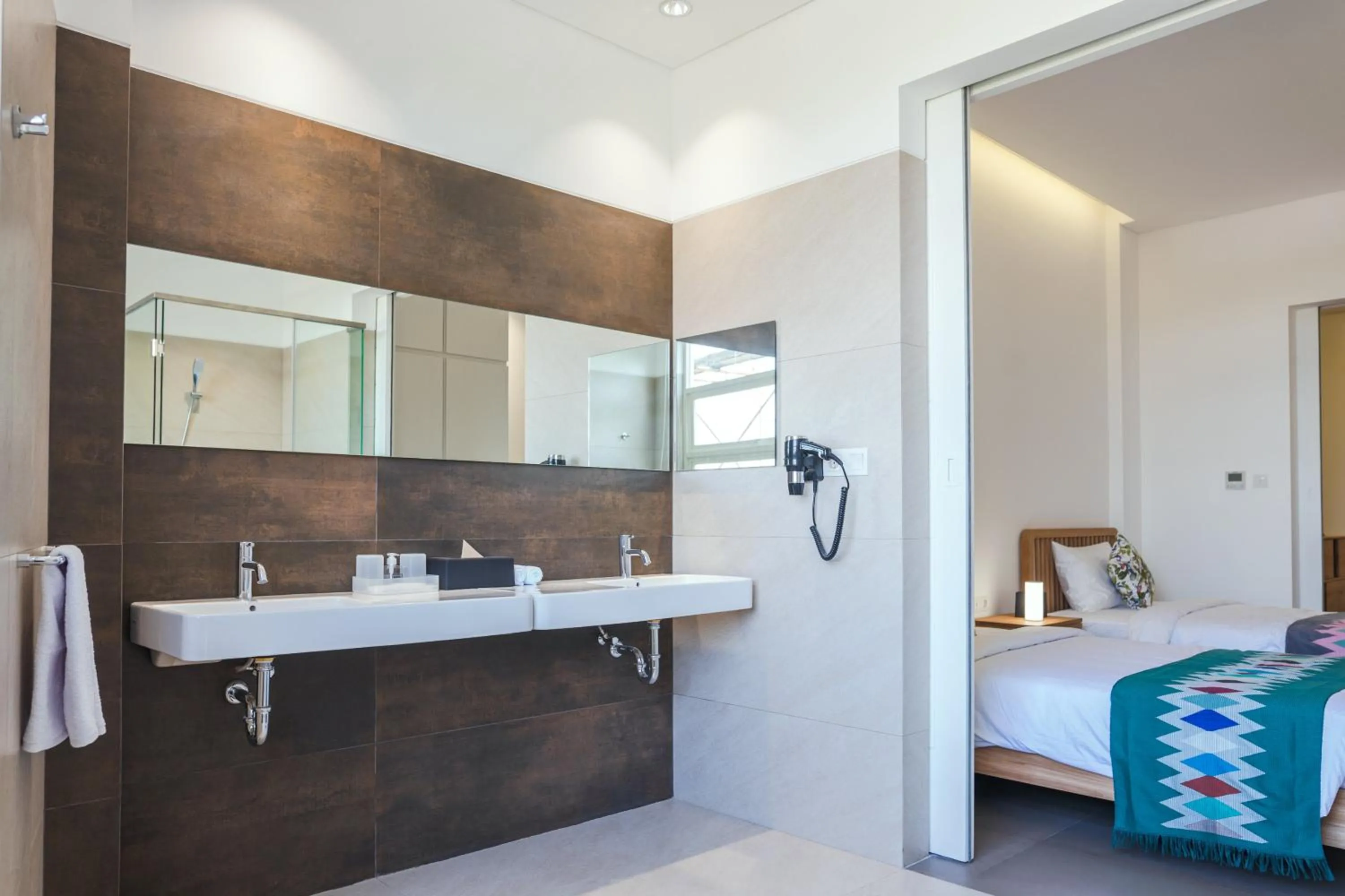 Bed in K Gallery Hotel