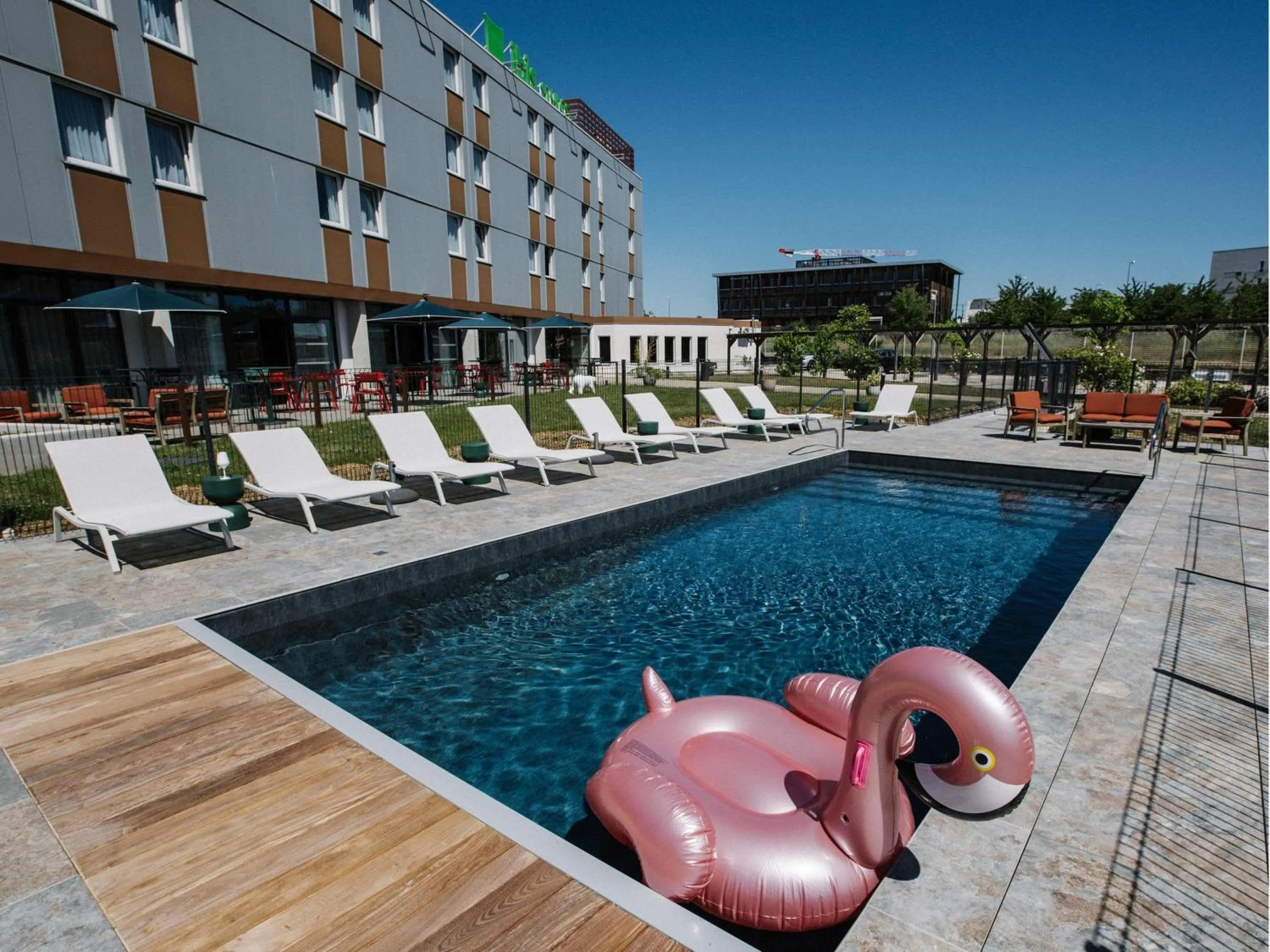 Pool view in Ibis Styles Dijon Nord Valmy