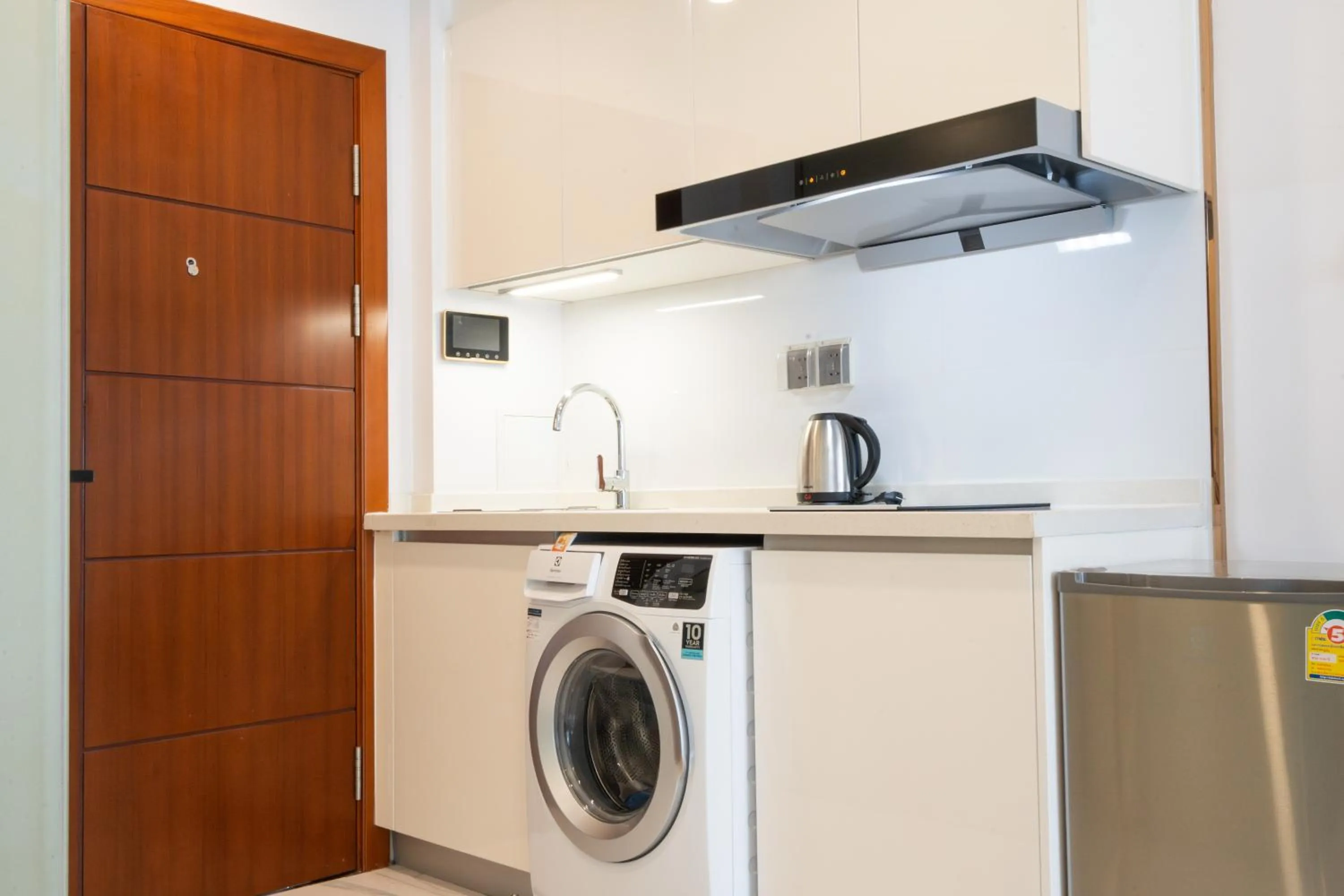 washing machine in One Park Hotel & Residence