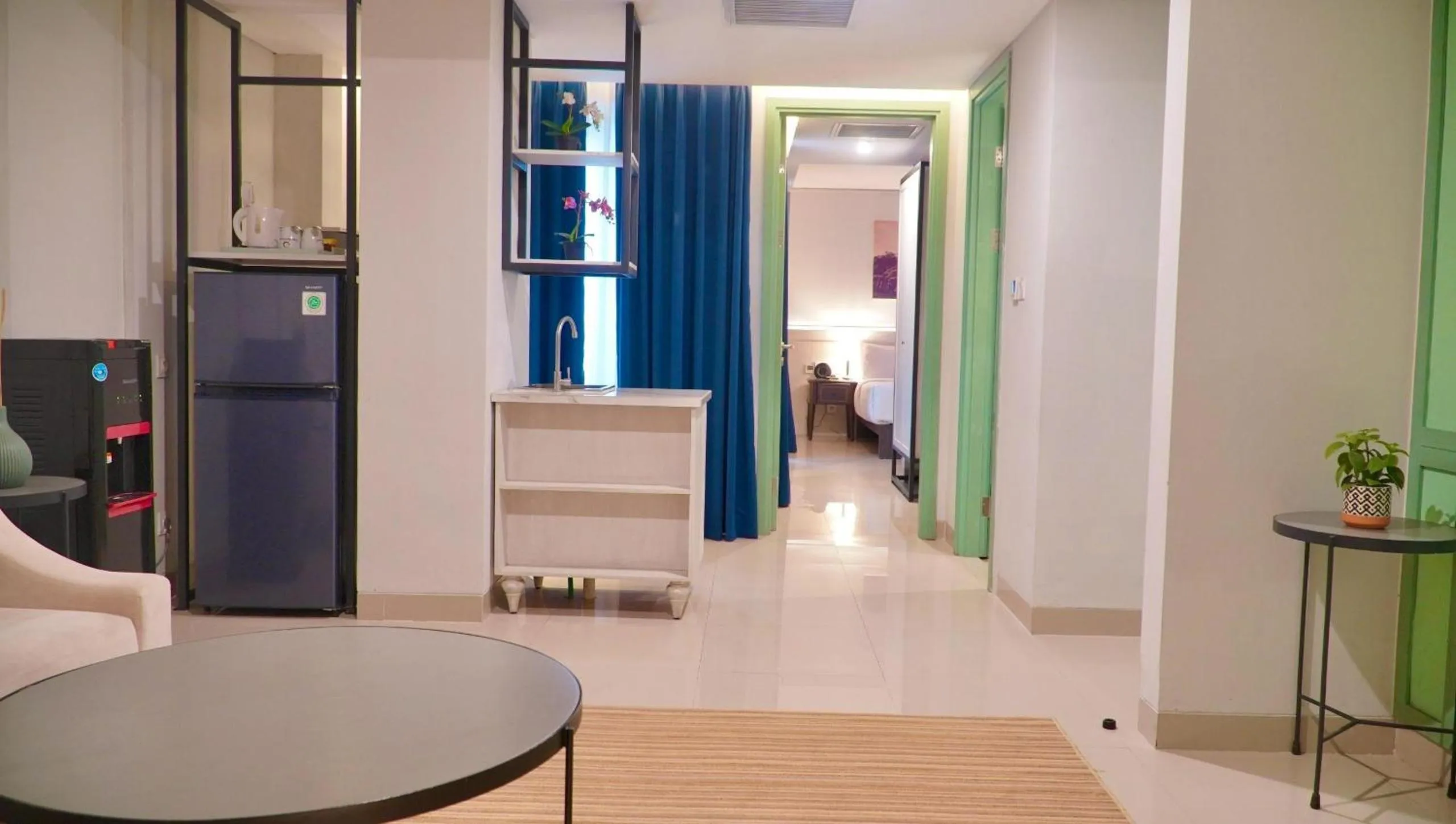 Living room, Bed in Jambuluwuk Thamrin Hotel