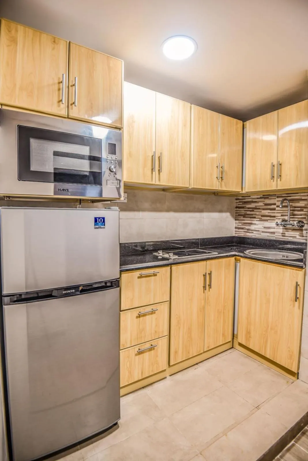 Kitchen or kitchenette in Grand Flora Hotel