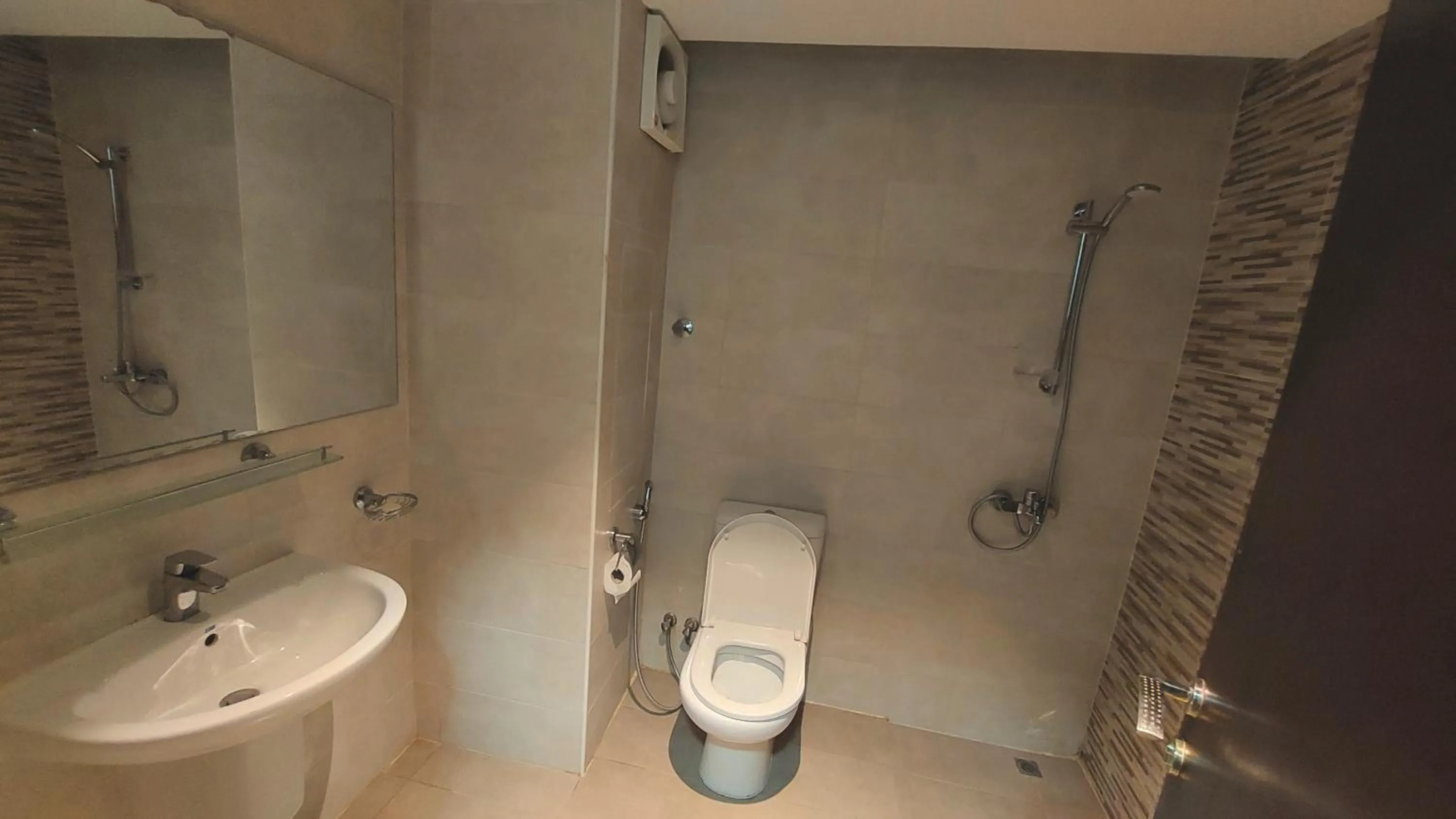 Toilet in Grand Flora Hotel