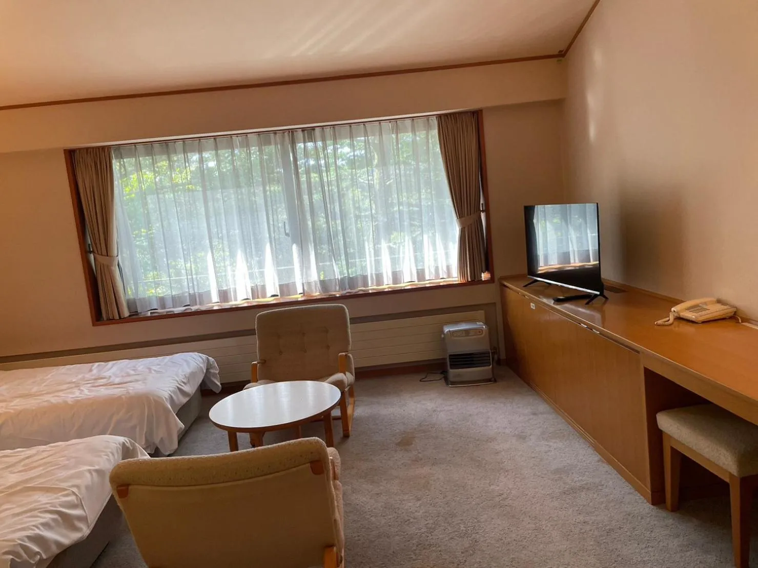 Bed in Lake Side Nikko Hotel