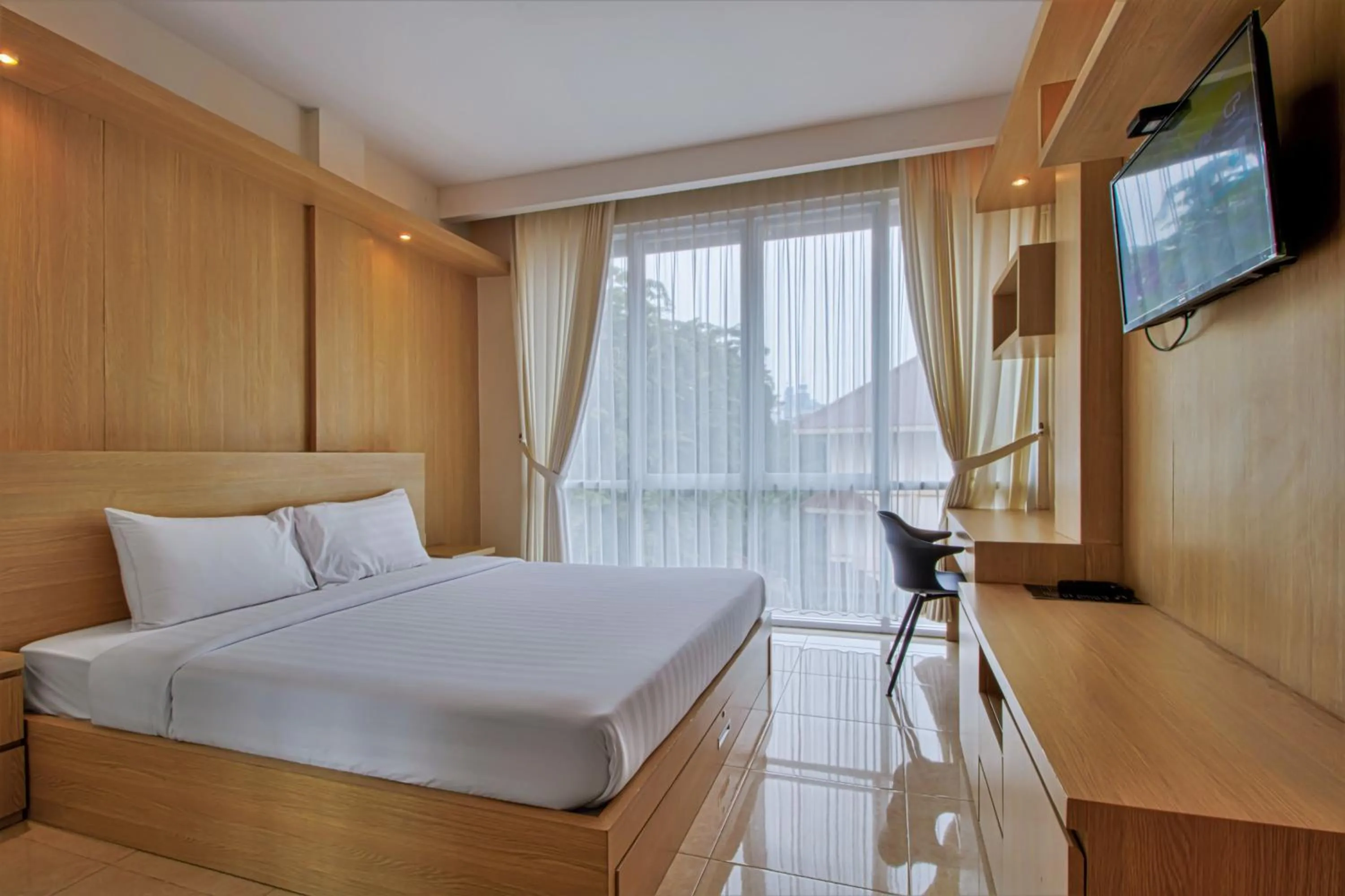 Bed, TV/Entertainment Center in D Padmaya Residence