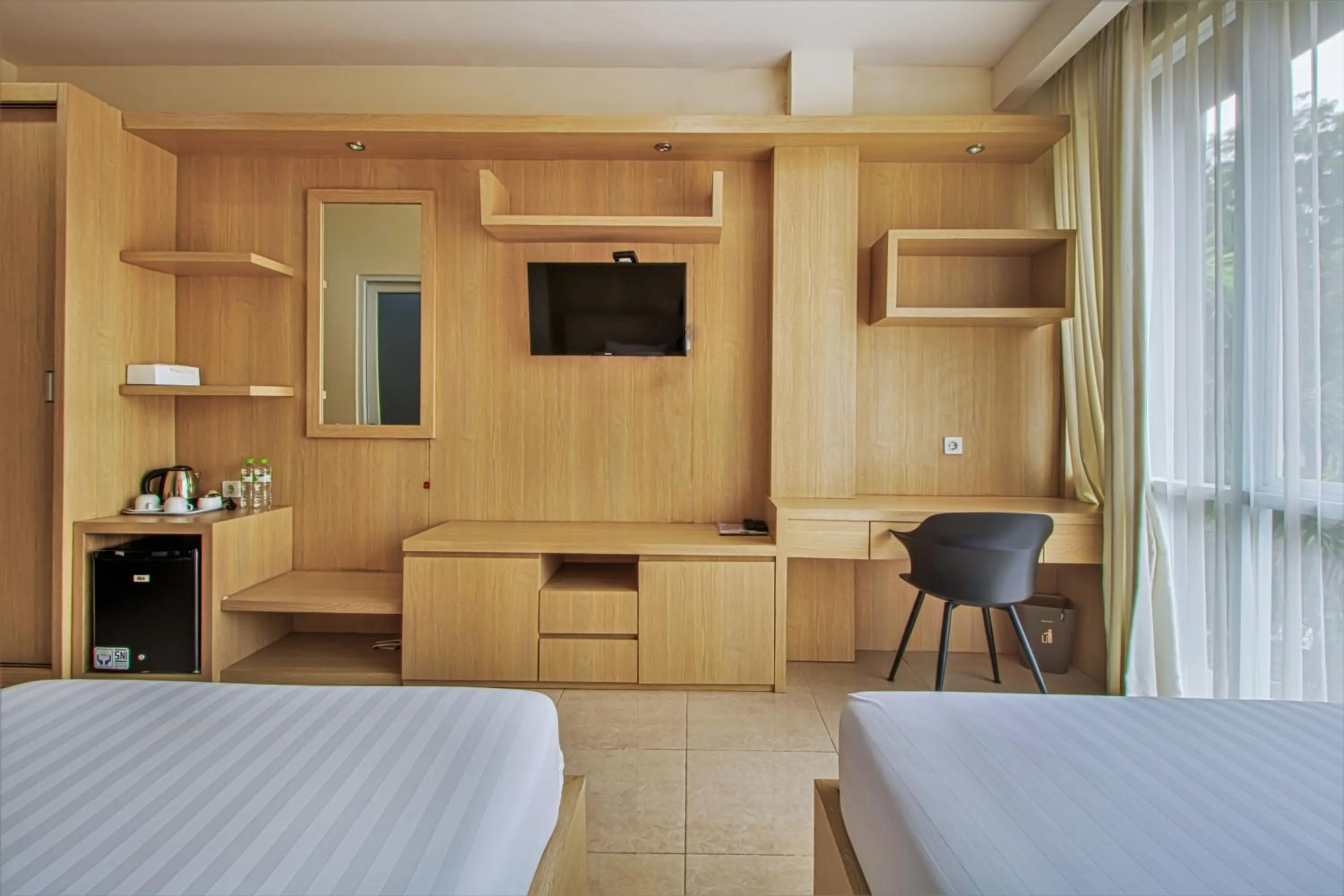 Bed, TV/Entertainment Center in D Padmaya Residence