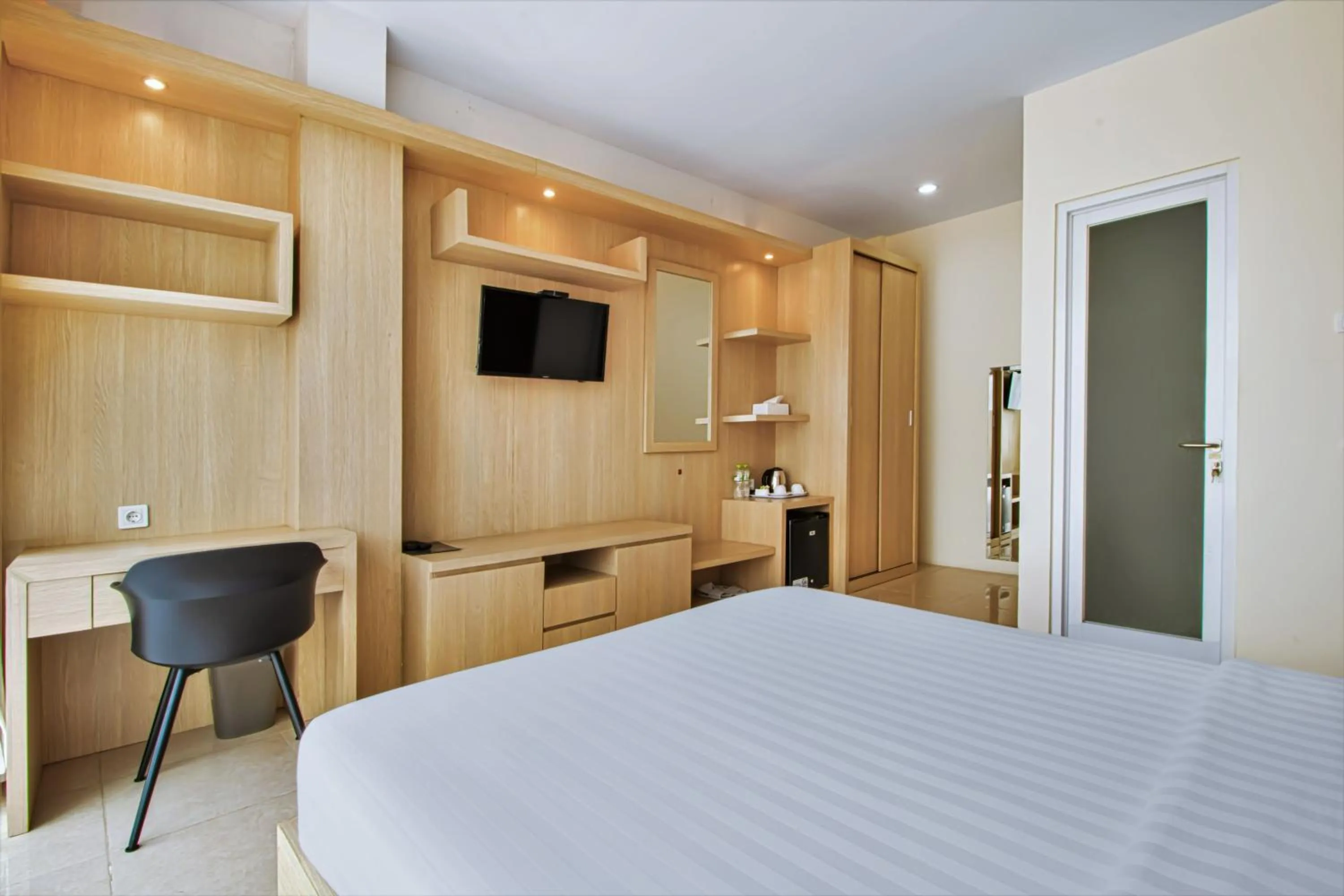 Bed, TV/Entertainment Center in D Padmaya Residence