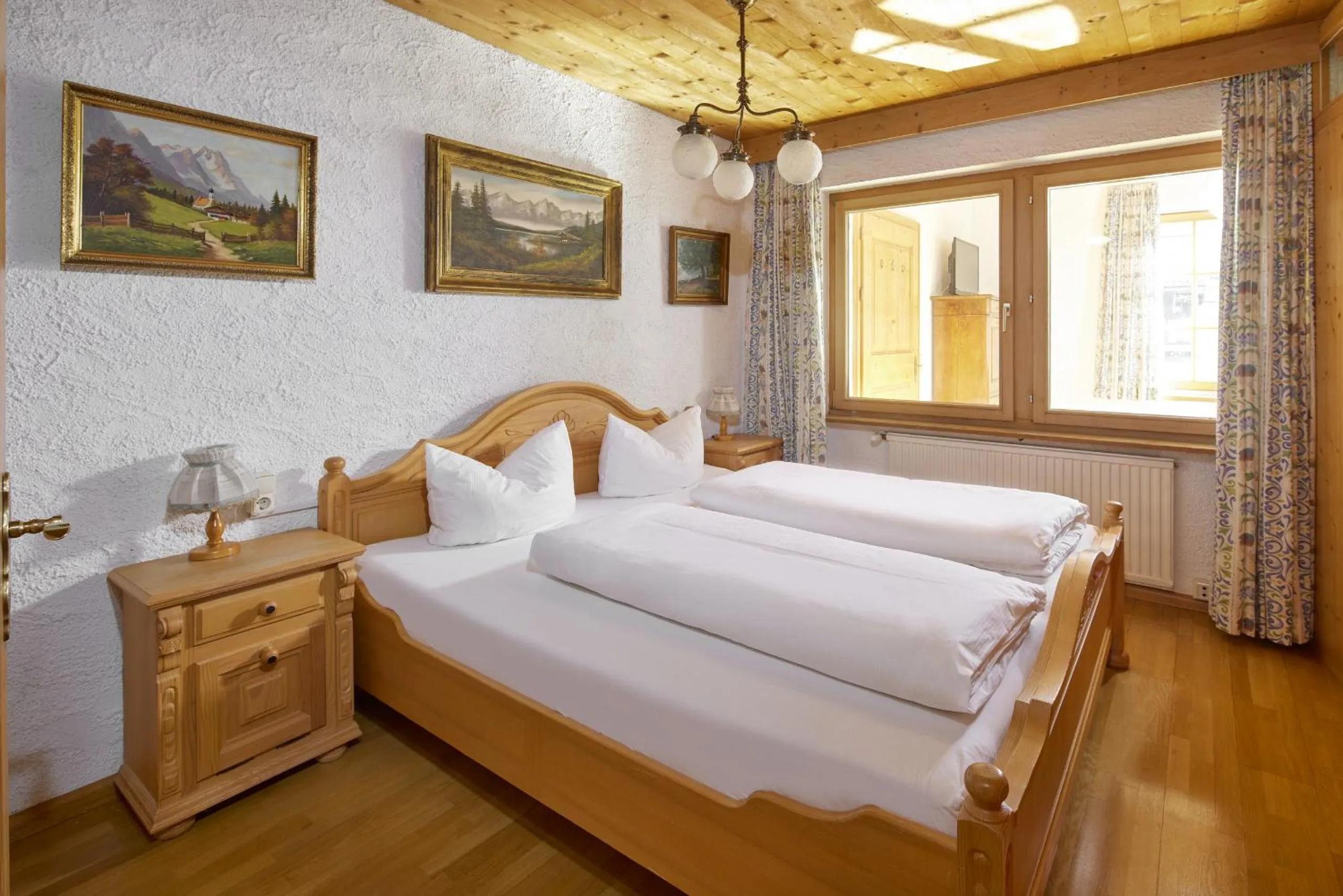 Bed in Alt Montafon Hotel Appartements by Pferd auf Wolke