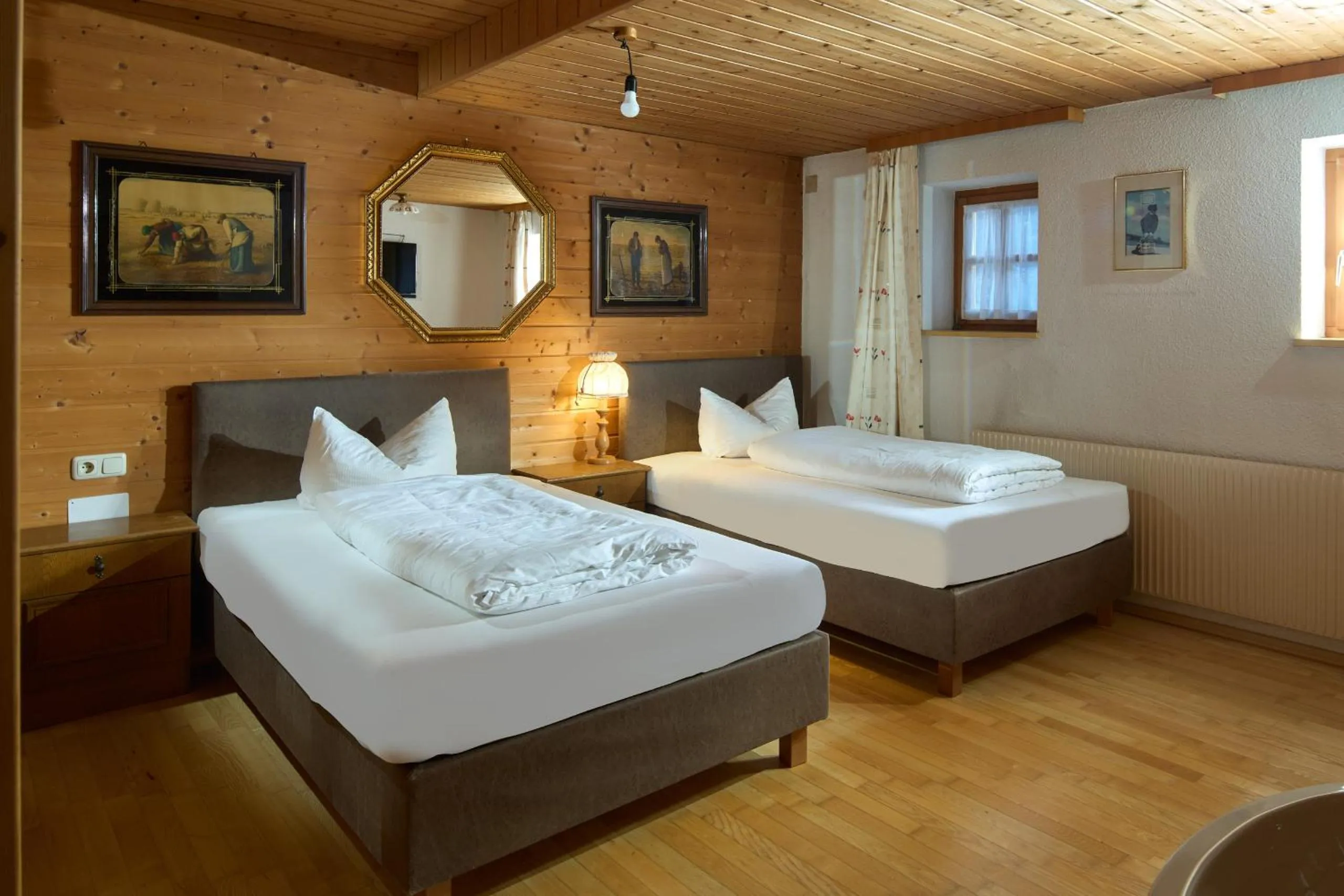 Bed in Alt Montafon Hotel Appartements by Pferd auf Wolke