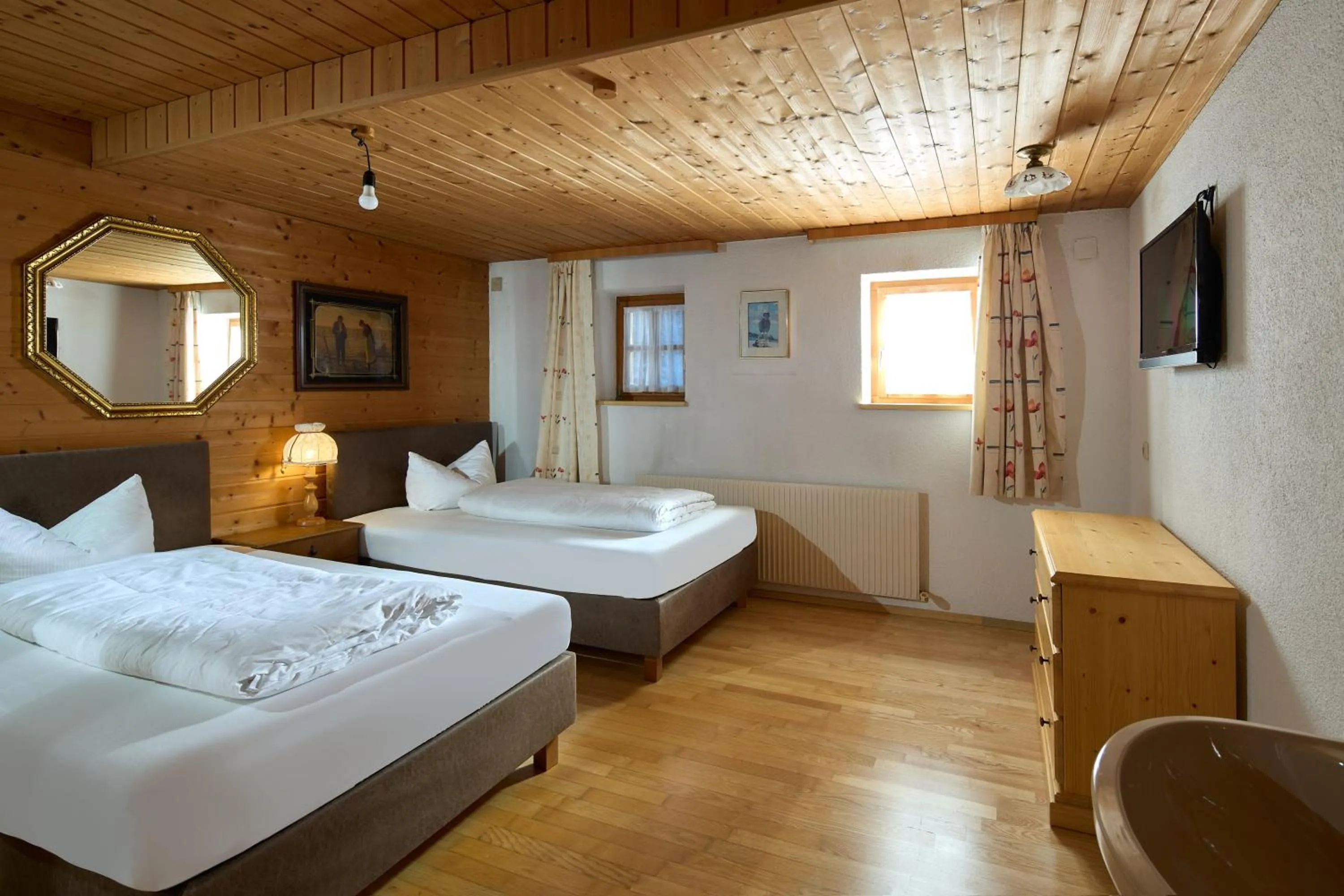 Bed in Alt Montafon Hotel Appartements by Pferd auf Wolke