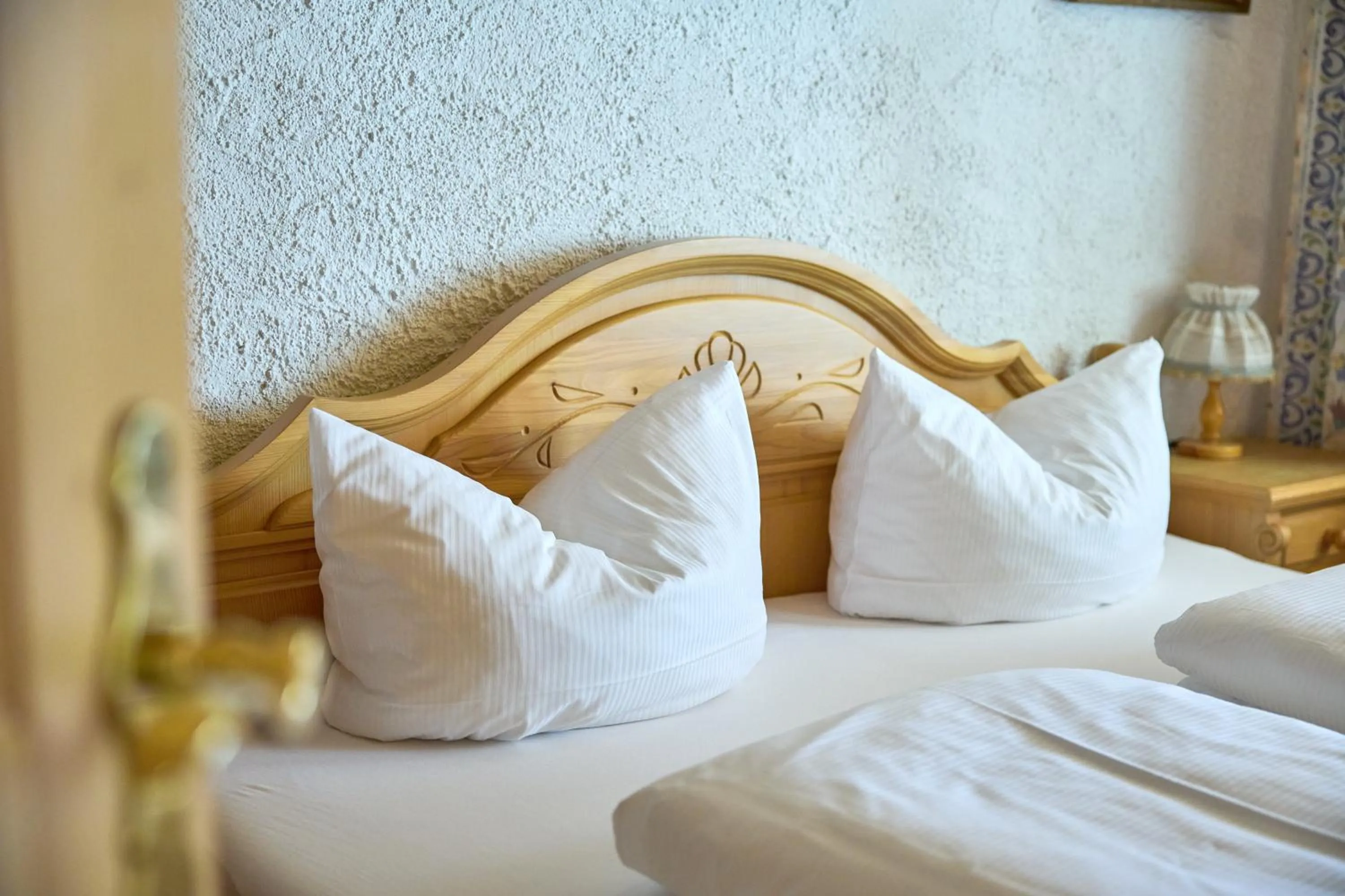 Bed in Alt Montafon Hotel Appartements by Pferd auf Wolke