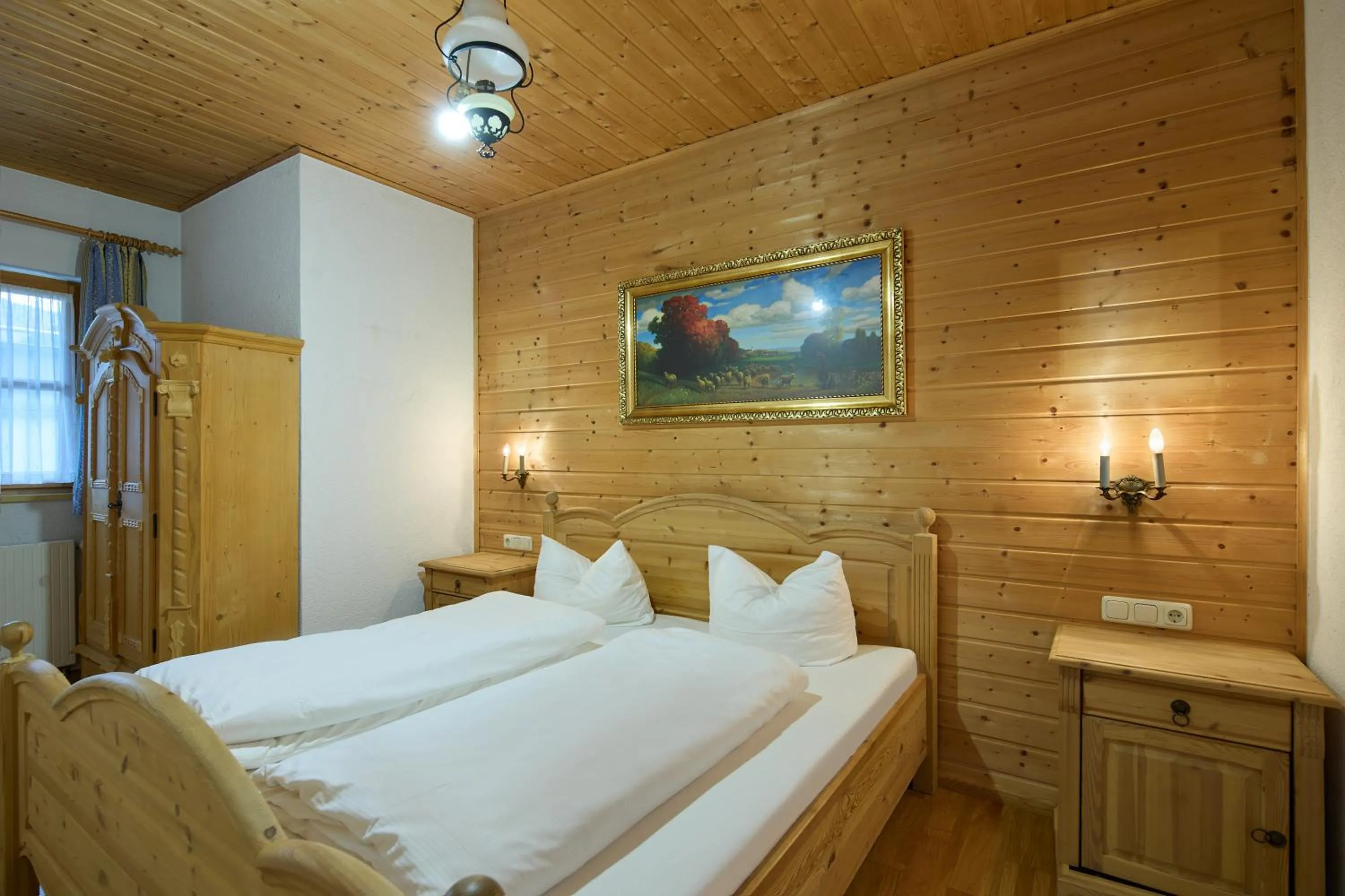 Bed in Alt Montafon Hotel Appartements by Pferd auf Wolke