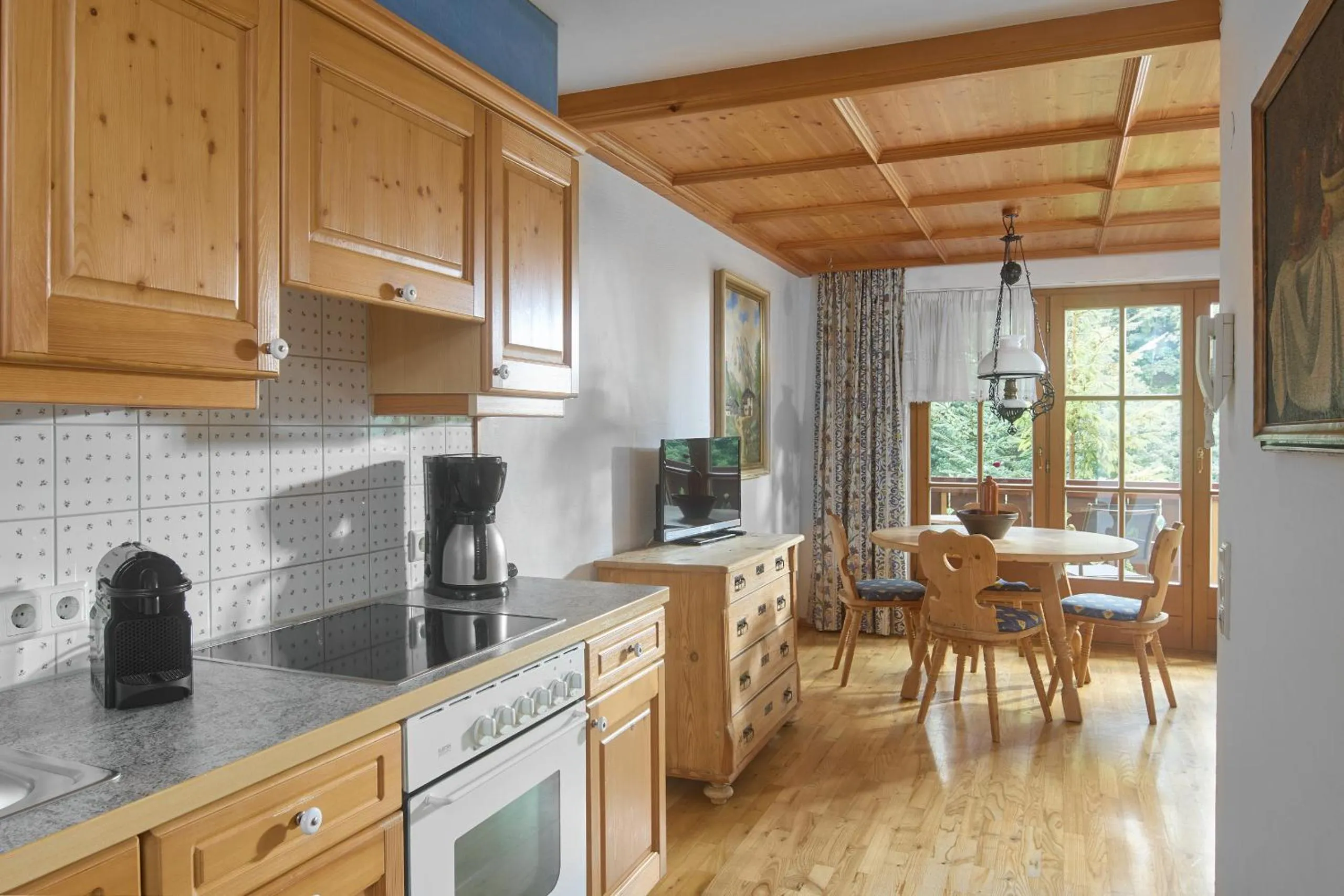 Kitchen or kitchenette in Alt Montafon Hotel Appartements by Pferd auf Wolke