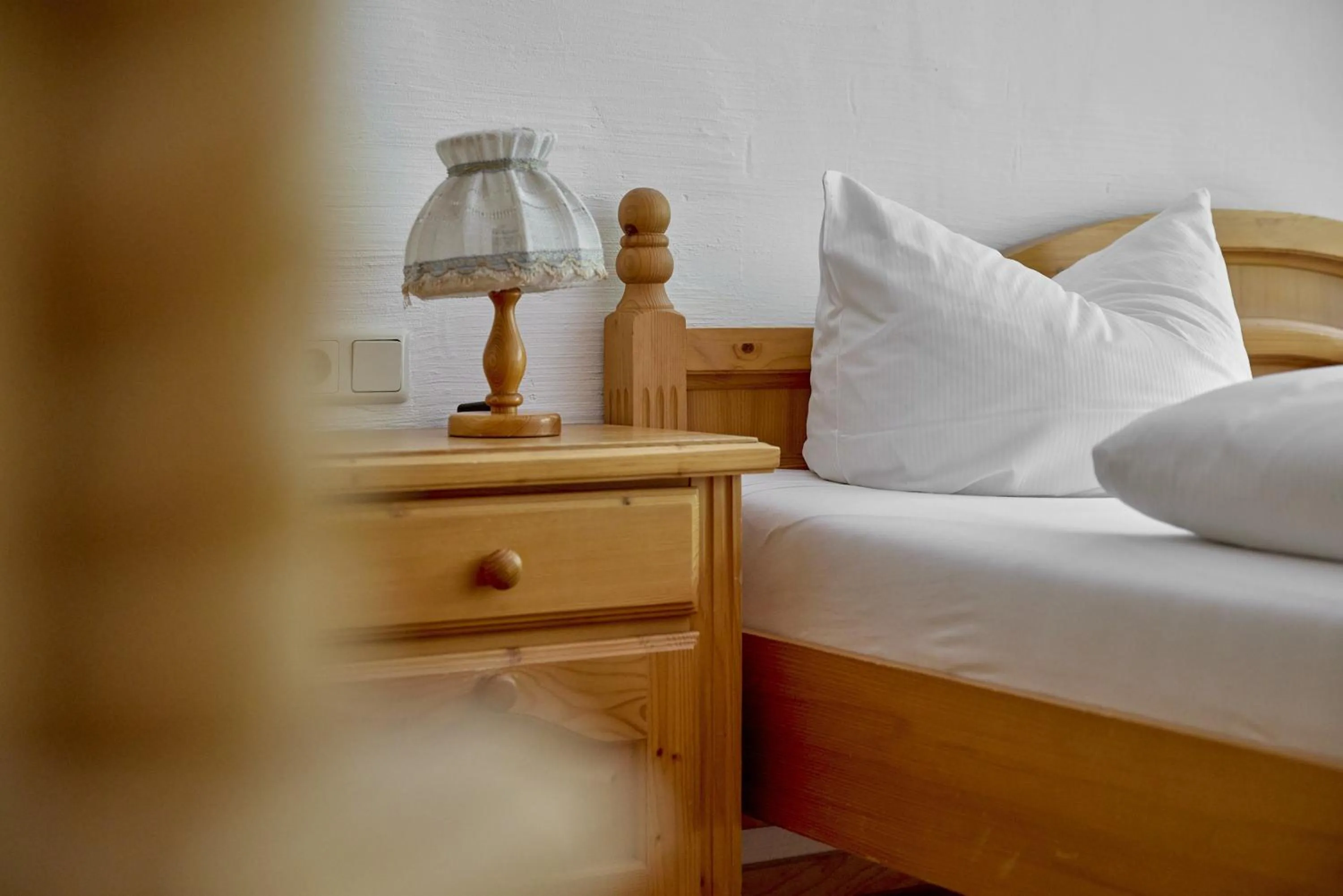 Bed in Alt Montafon Hotel Appartements by Pferd auf Wolke