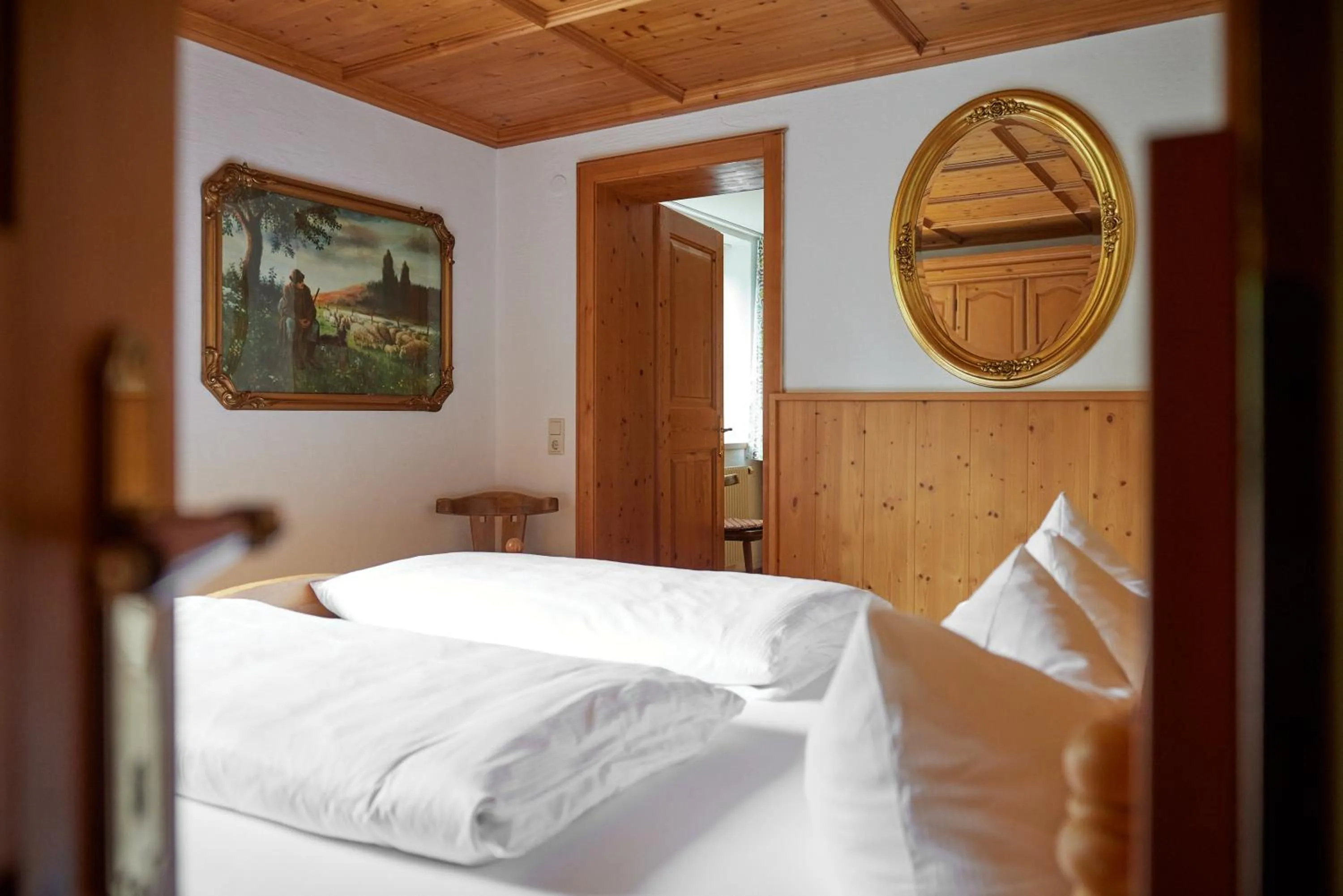 Bed in Alt Montafon Hotel Appartements by Pferd auf Wolke