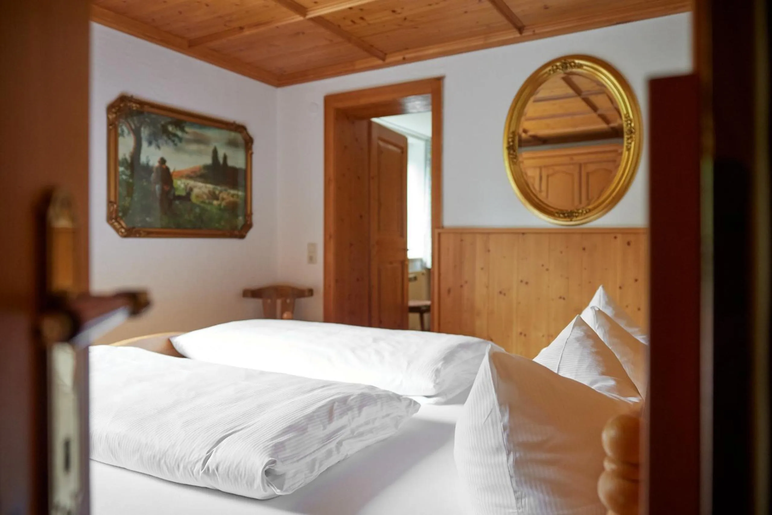 Bed in Alt Montafon Hotel Appartements by Pferd auf Wolke