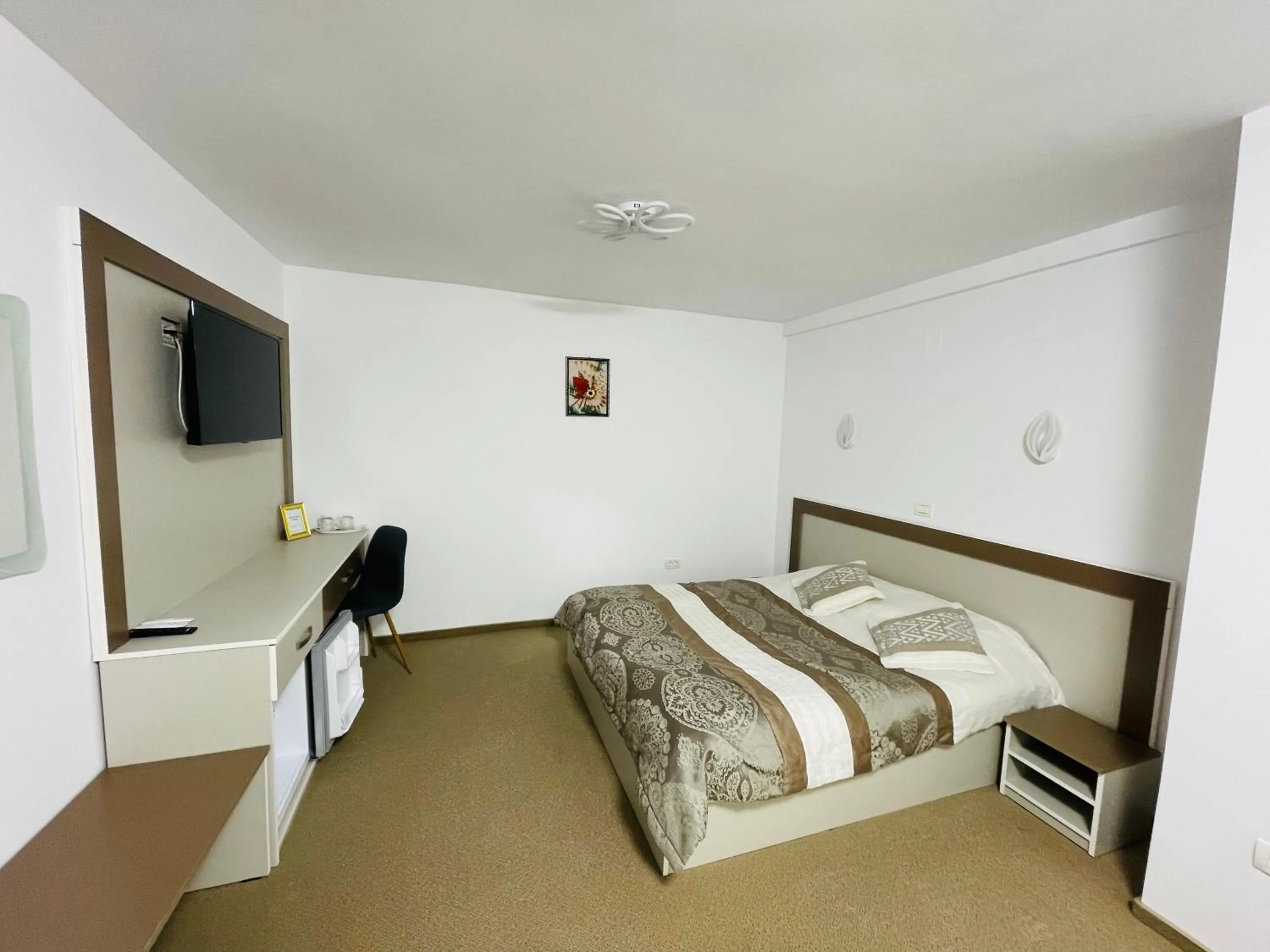 Bed in Pensiunea Sport