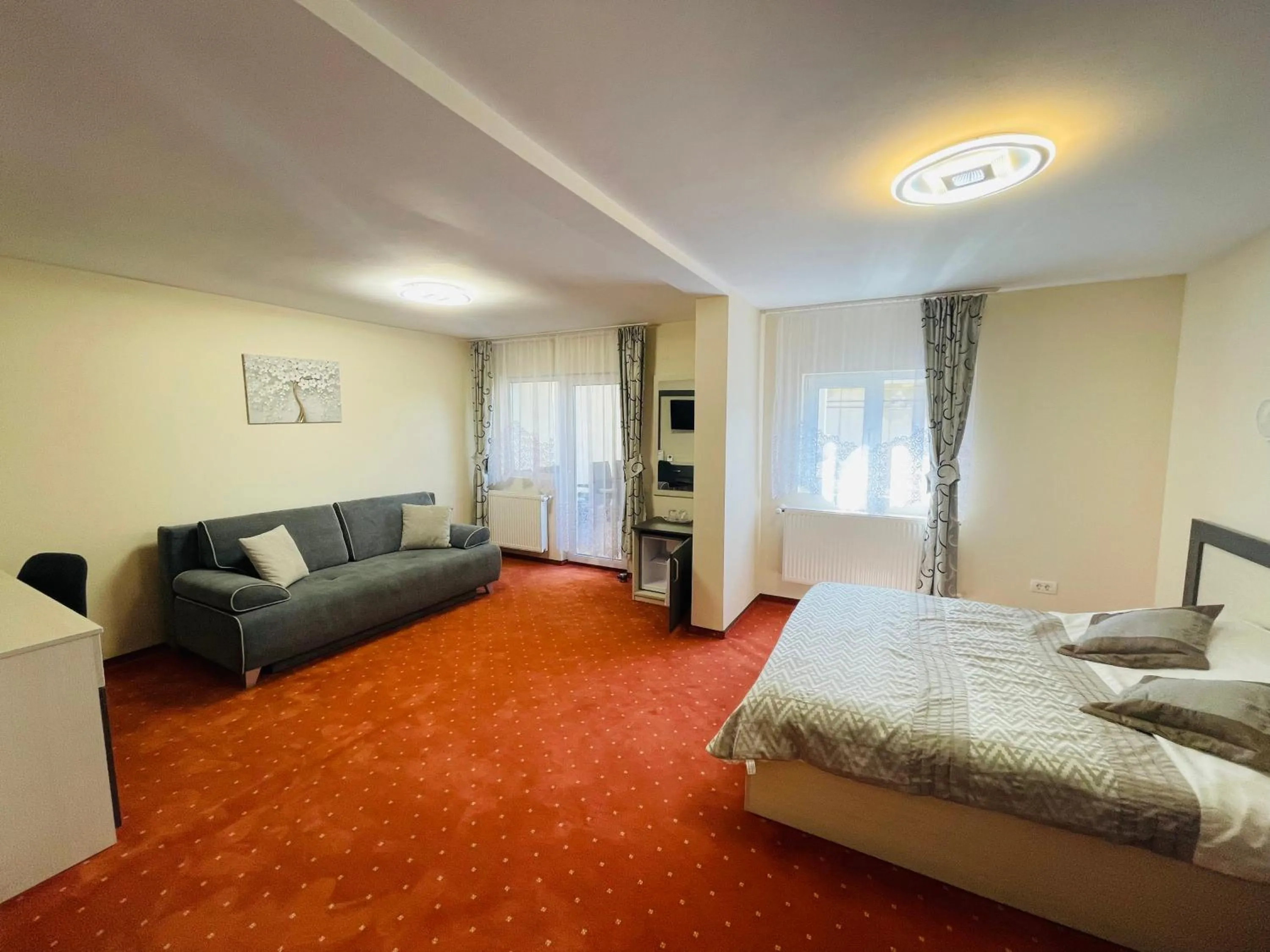 Bed in Pensiunea Sport