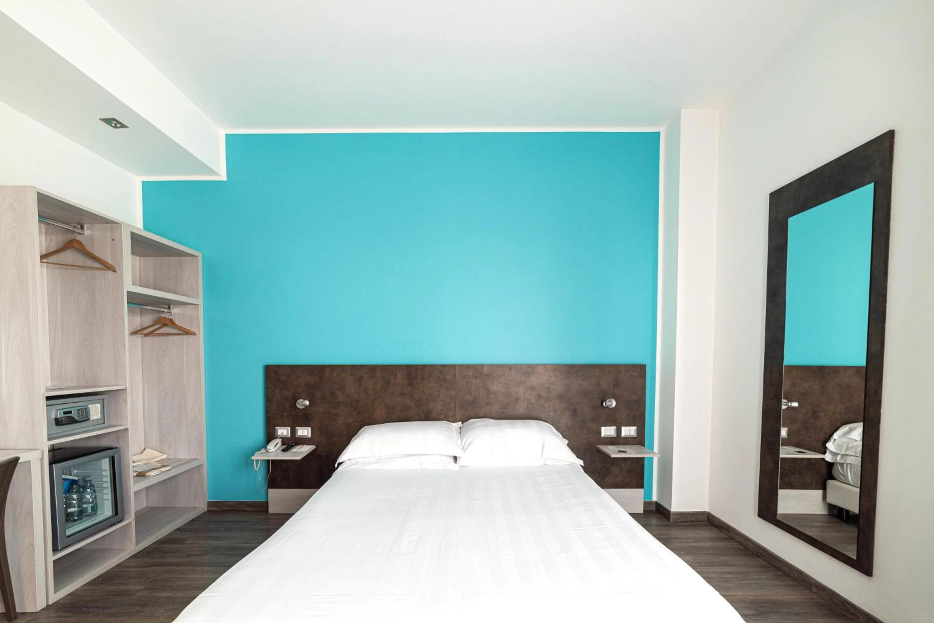 Bed in Phi Hotel Milano